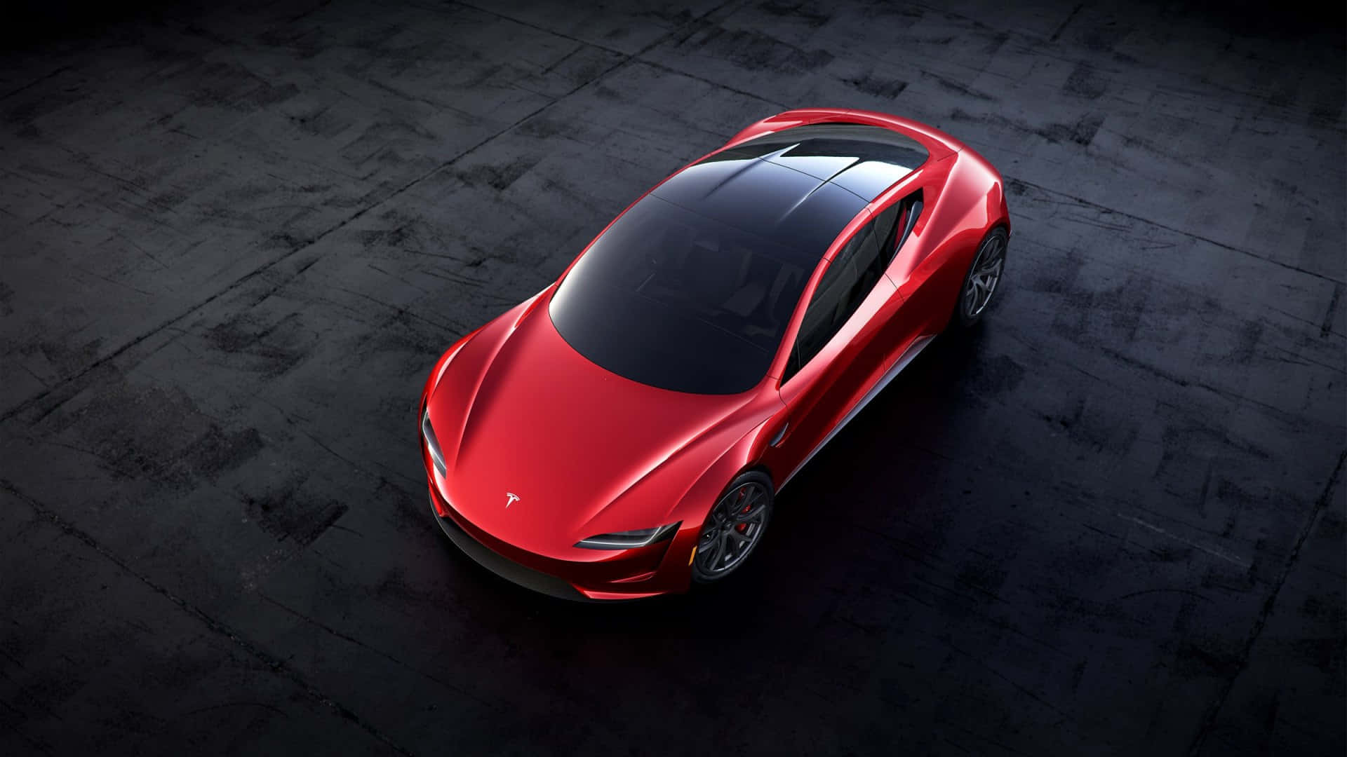 Caption: Outstanding Elegance - Tesla Roadster Background