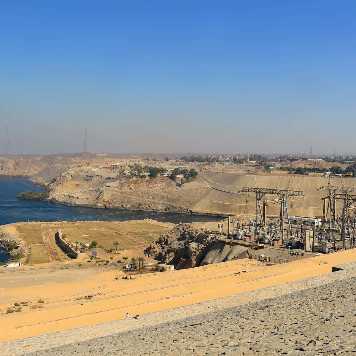 Caption: Panoramic View Of Aswan High Dam, Egypt Background