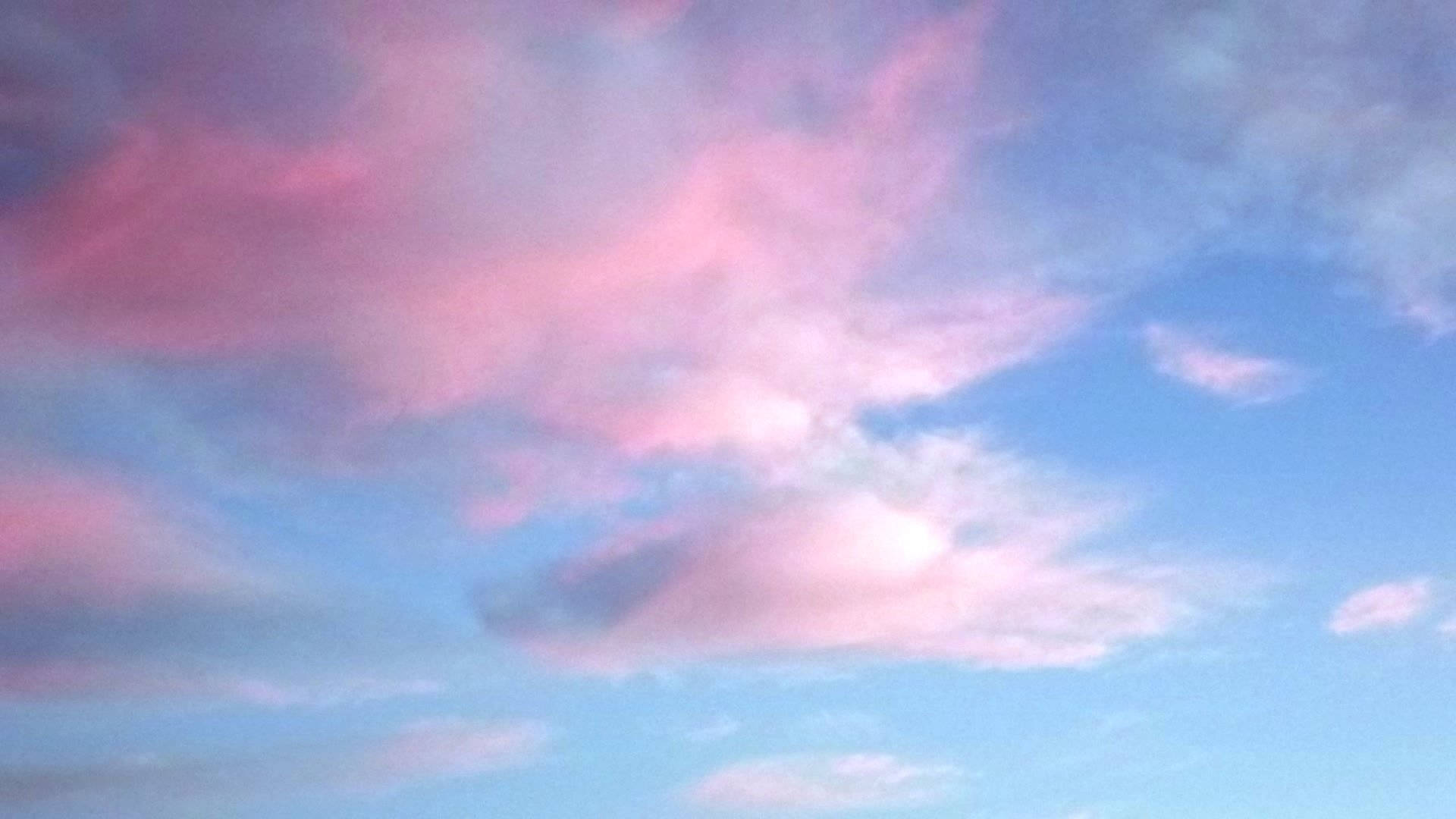 Caption: Pastel Blue And Pink Fusion Skies Background