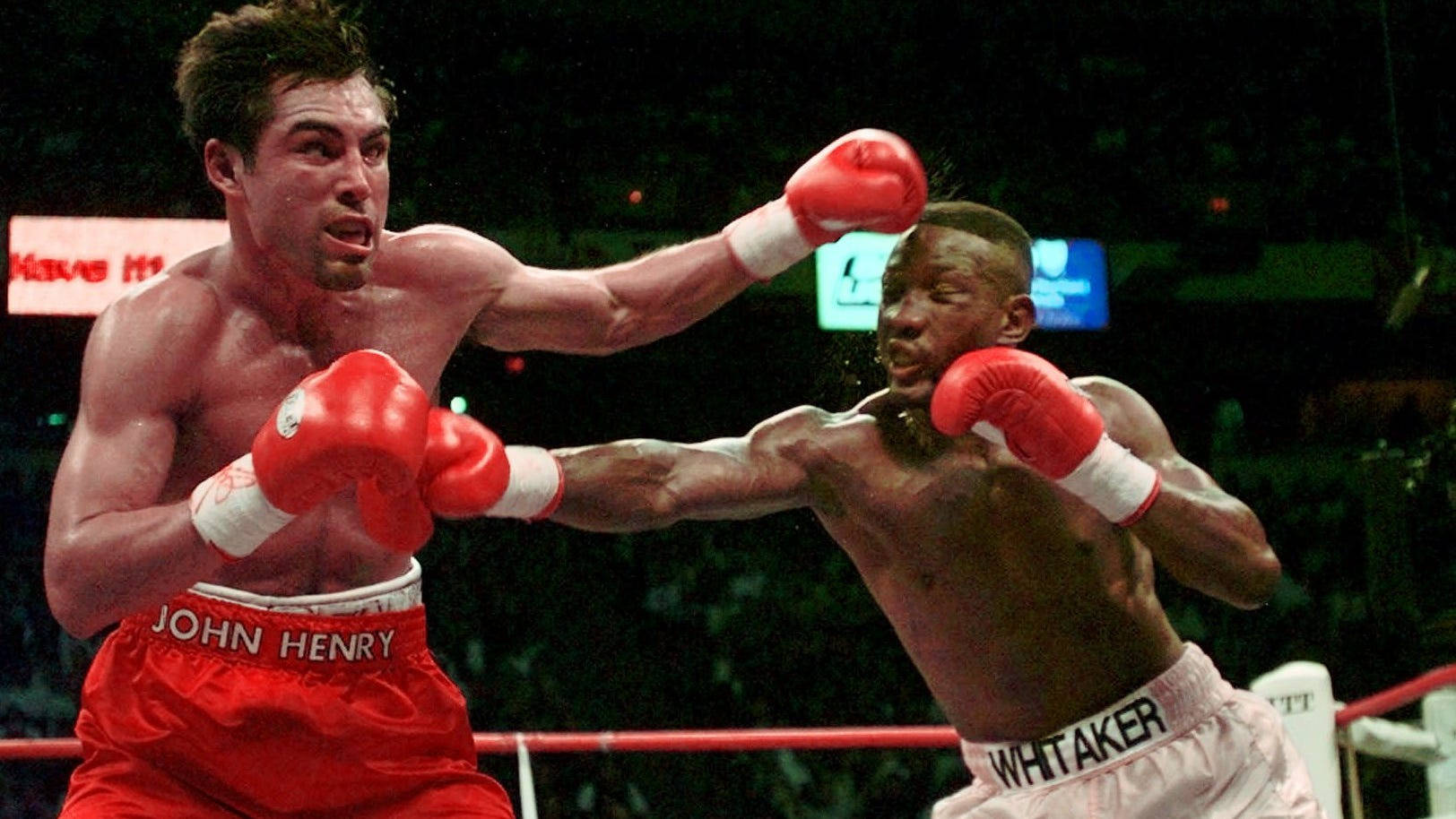 Caption: Pernell Whitaker Masterfully Dodging A Punch In The Ring