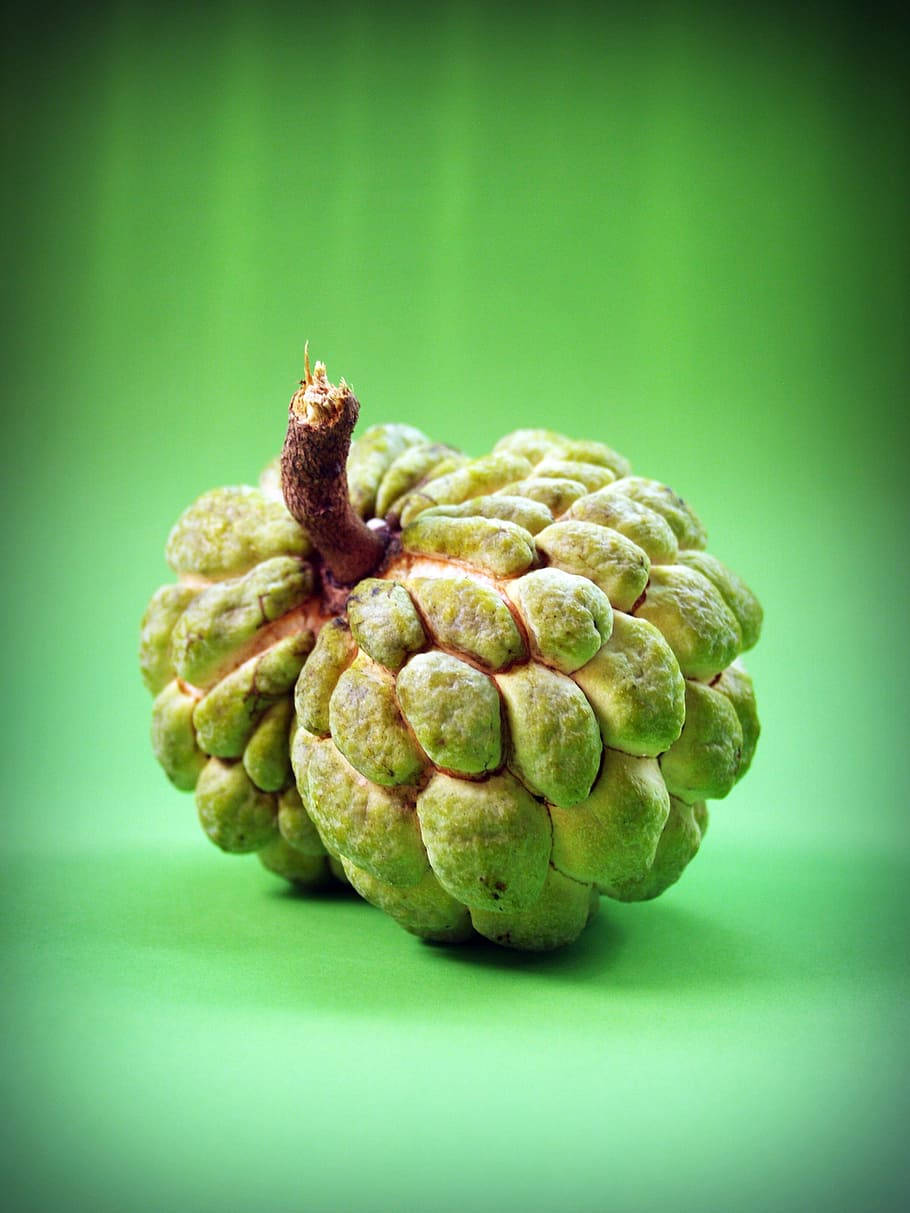 Caption: Picked At Perfection, A Fresh Custard Apple Background