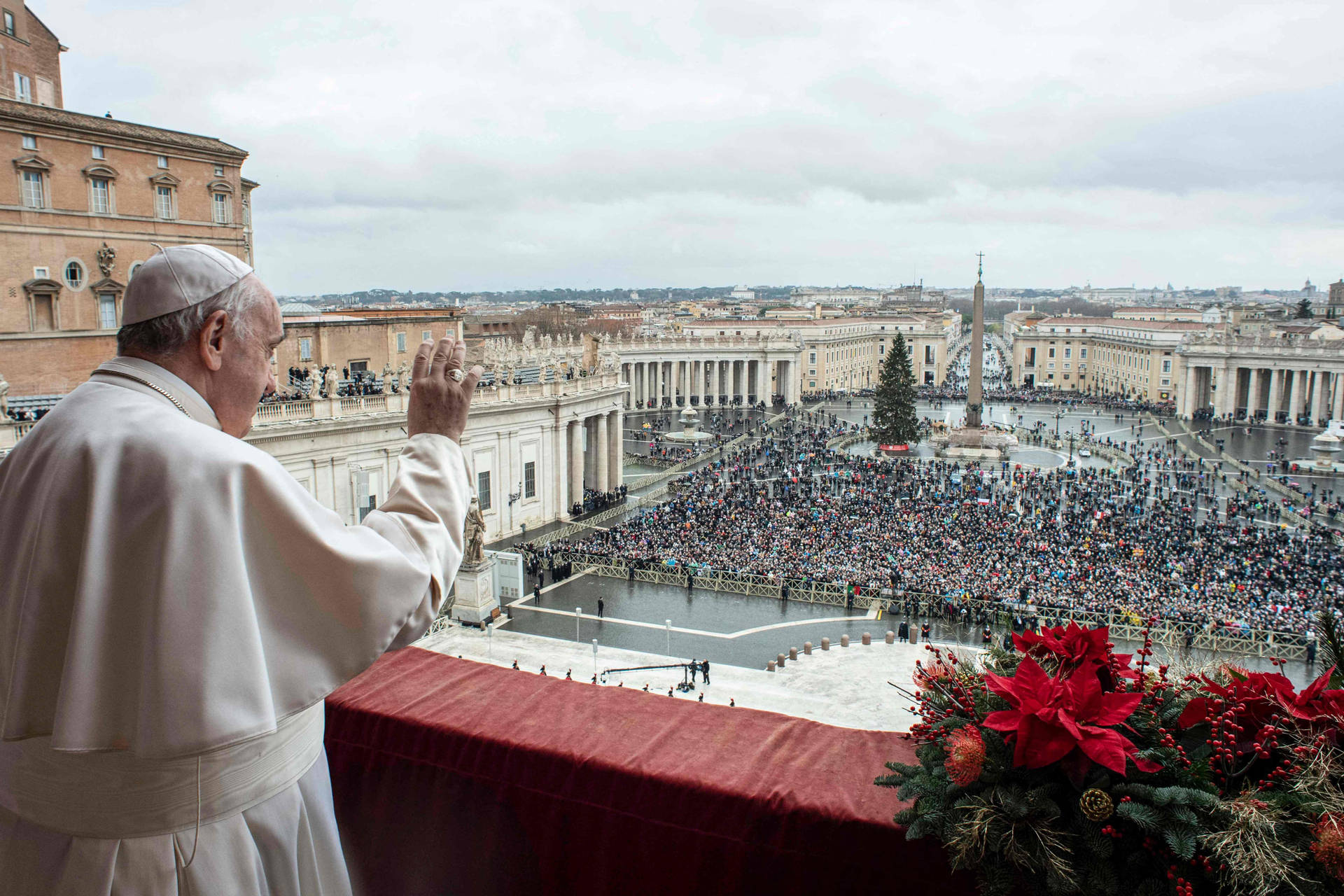 Caption: Pope Francis Greeting The Faithful At The Vatican Background