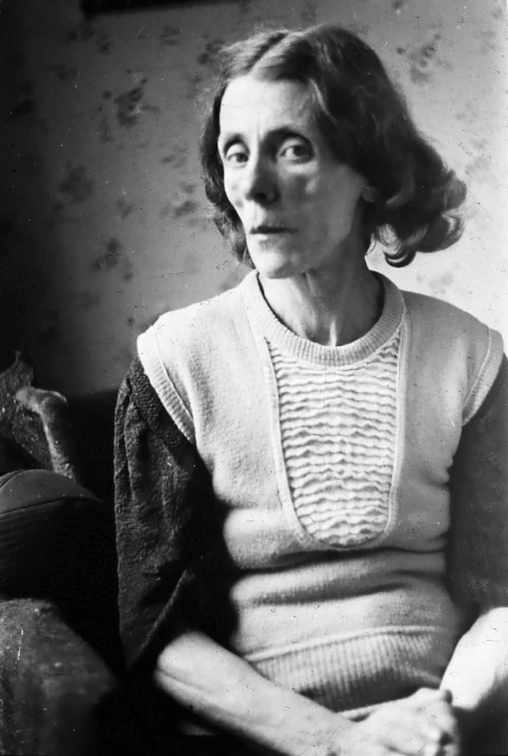 Caption: Portrait Of Emaciated Woman In Despair Background