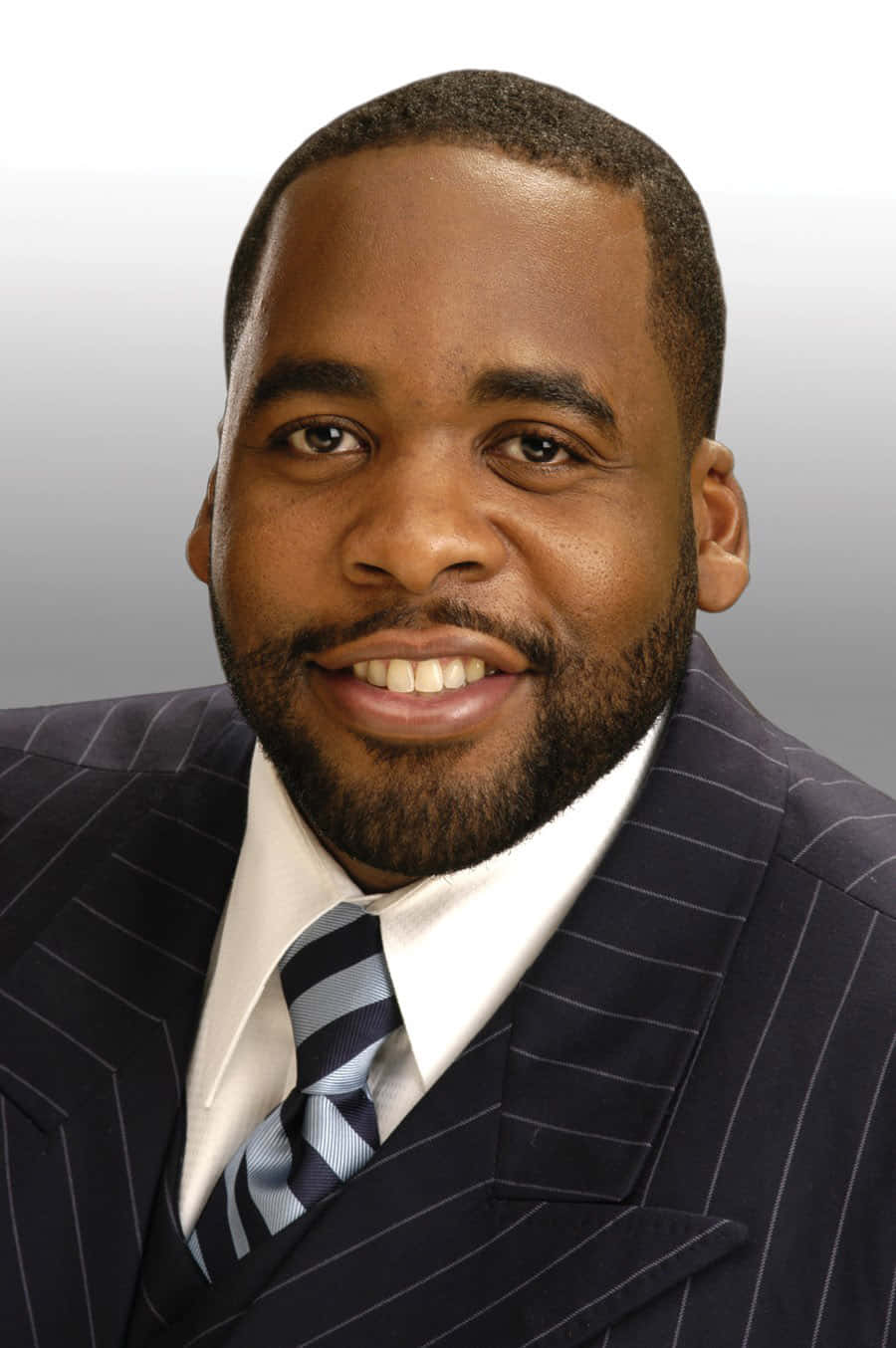 Caption: Portrait Of Kwame Kilpatrick, Former Mayor Of Detroit Background