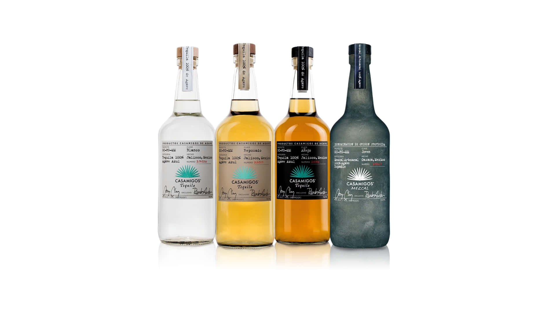 Caption: Premium Casamigos Tequila And Joven Mezcal Liquor Bottles Background