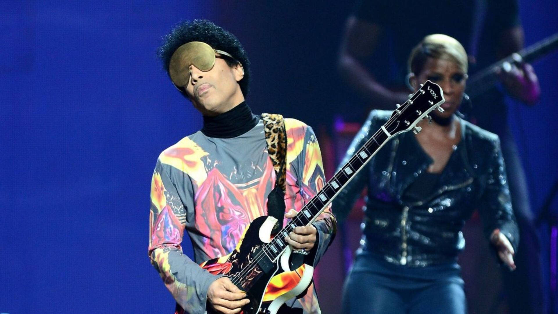 Caption: Prince Performing On Stage