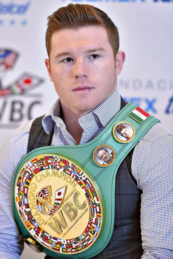 Caption: Professional Boxer Saul 'canelo' Alvarez In Formal Attire Background