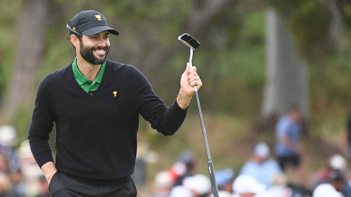 Caption: Professional Golfer Adam Hadwin During Practice Session Background