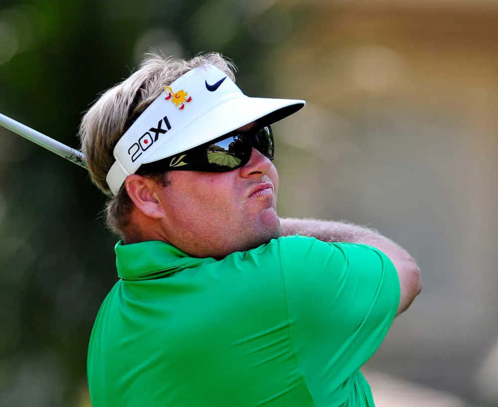 Caption: Professional Golfer Carl Pettersson In Action Background