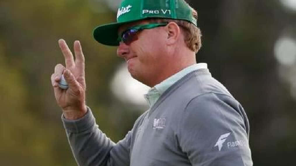 Caption: Professional Golfer - William Mcgirt Making A Peace Sign Background