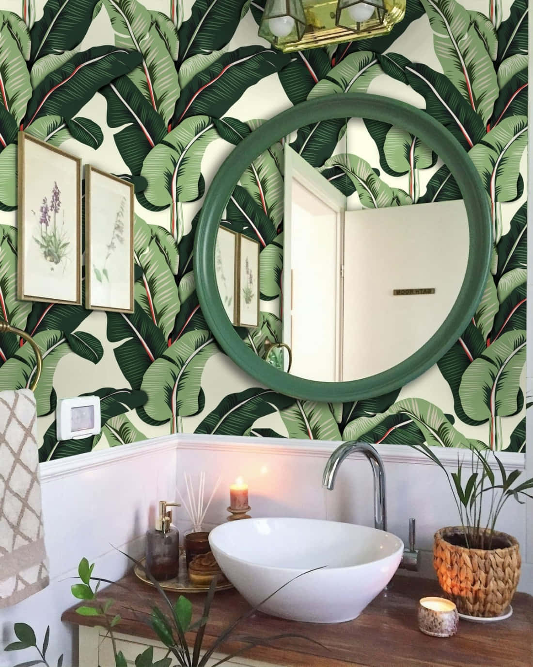 Caption: Refreshing Tropical Bathroom With Green Leafy Walls Background
