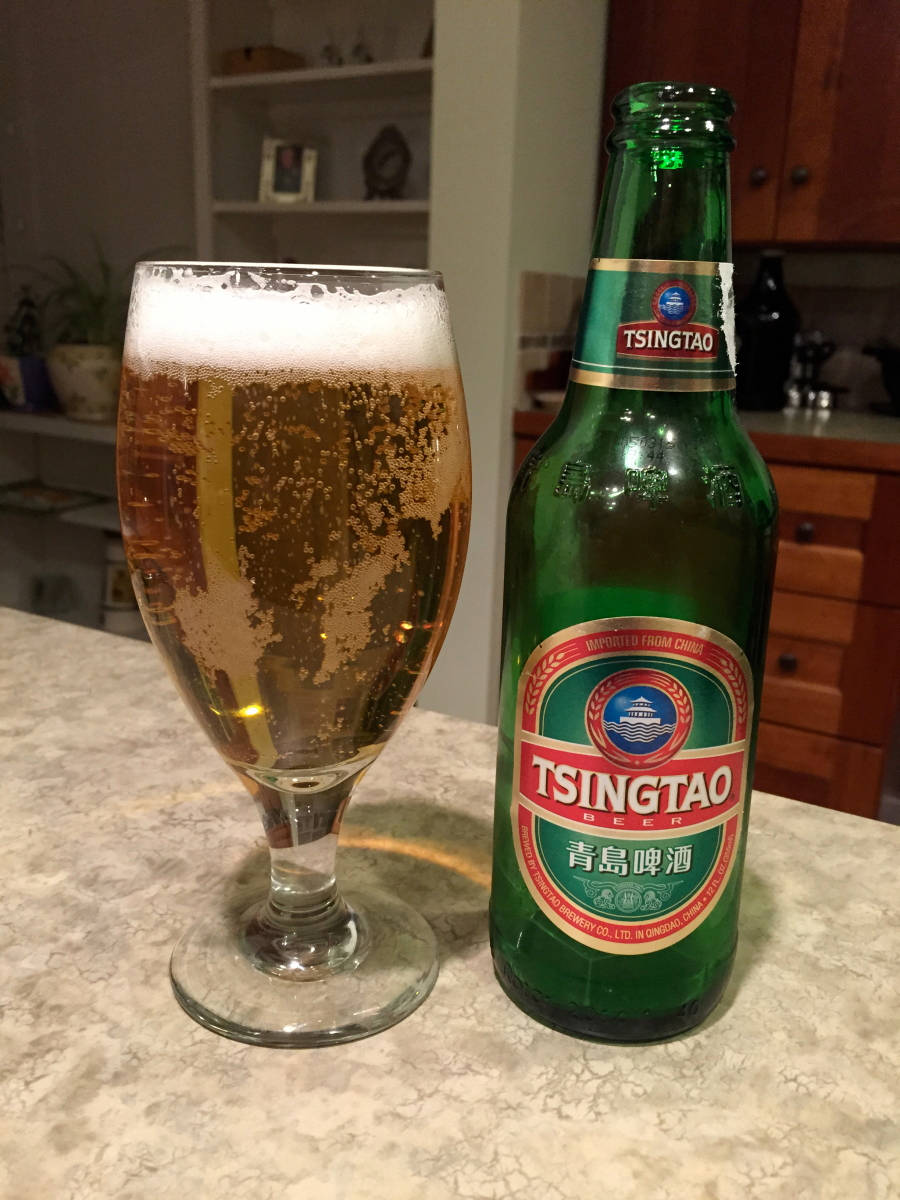 Caption: Refreshing Tsingtao Beer - China's Finest Lager Background