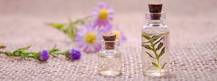 Caption: Rejuvenating Ayurveda Essential Oils Background