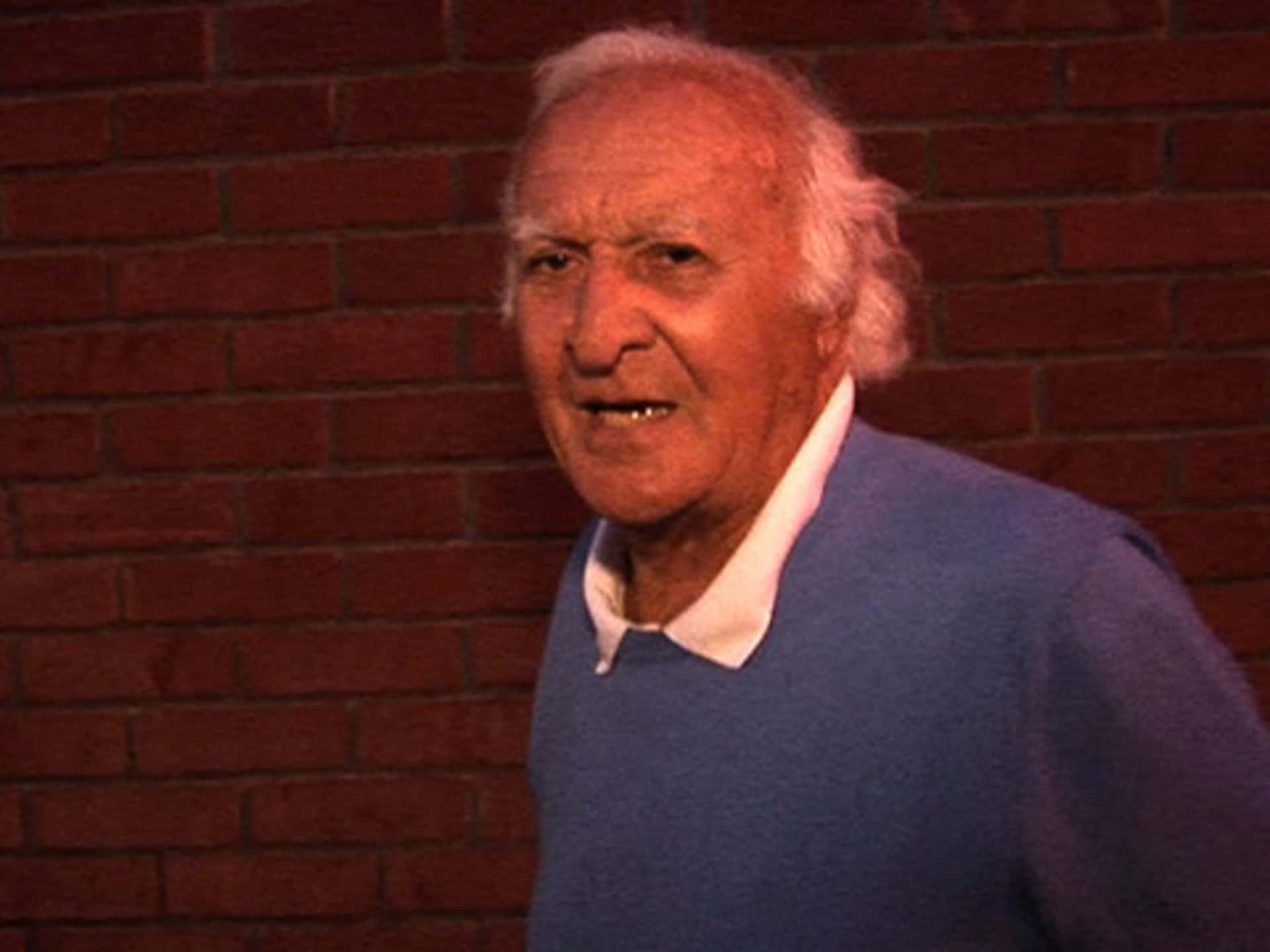 Caption: Robert Loggia In Casual Attire Background