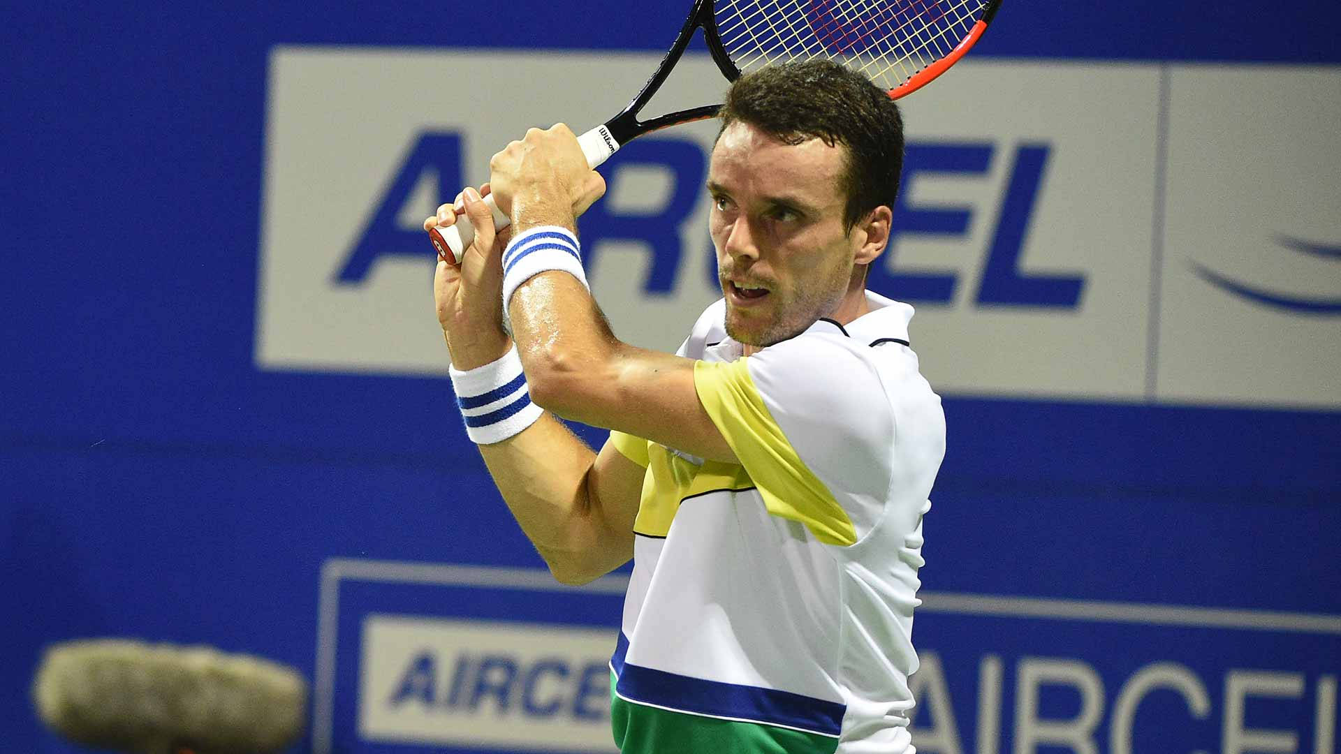 Caption: Roberto Bautista Agut - The Intense Competitor Background