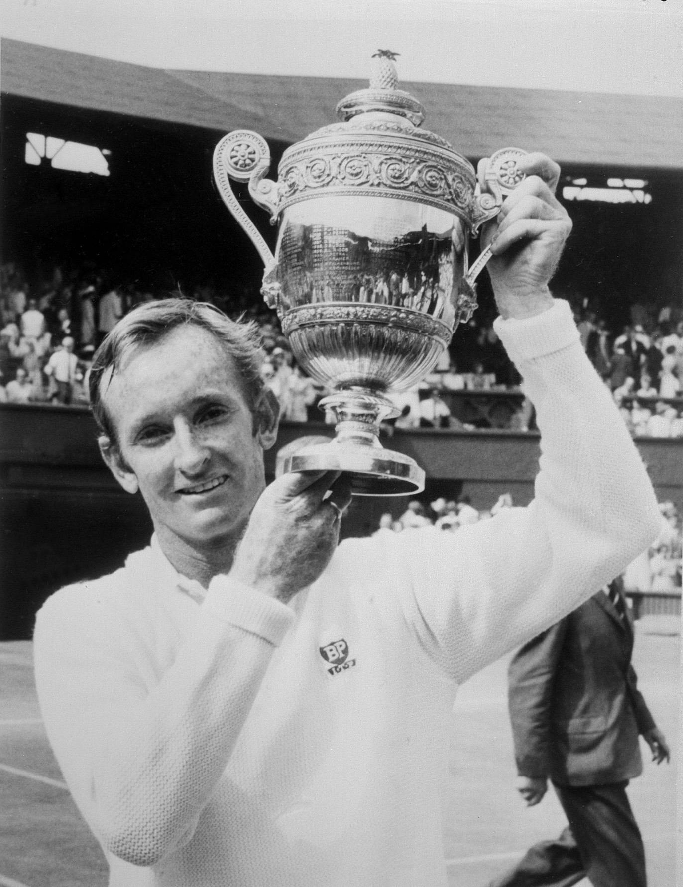 Caption: Rod Laver Scoring A Win At Wimbledon International Tournament. Background