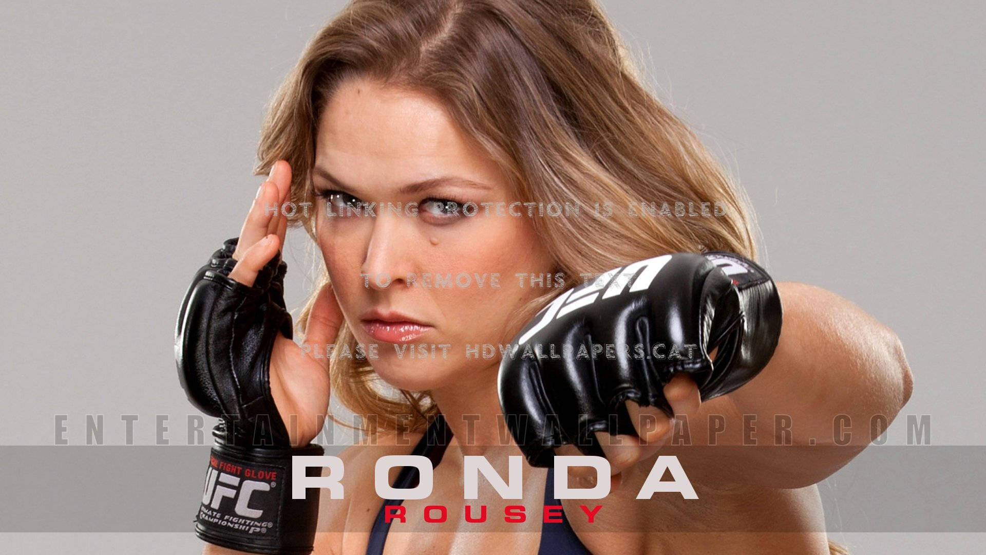 Caption: Ronda Rousey: An Embodiment Of Strength Background