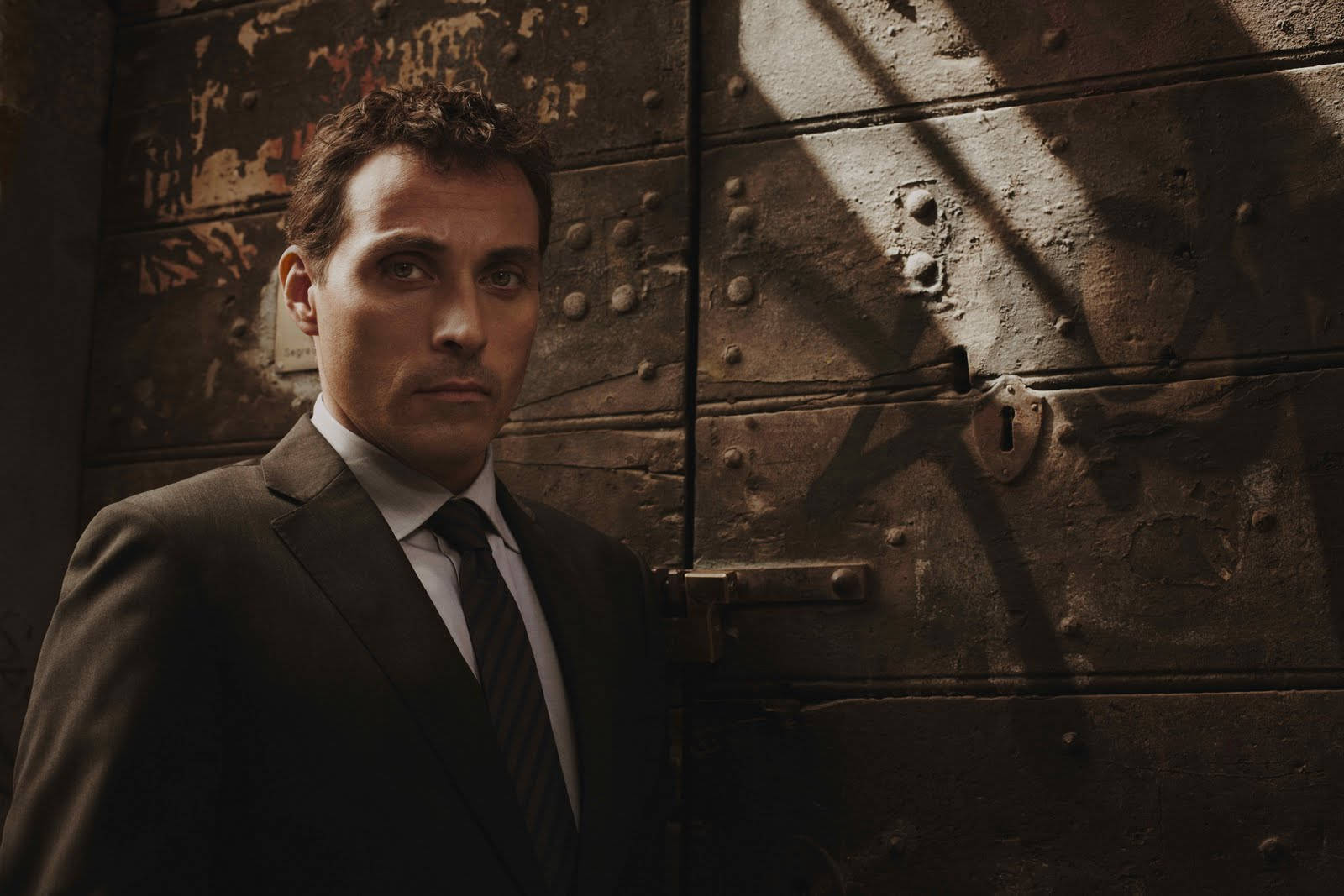 Caption: Rufus Sewell In His Role As Mark Easterbrook In 'the Pale Horse' Background