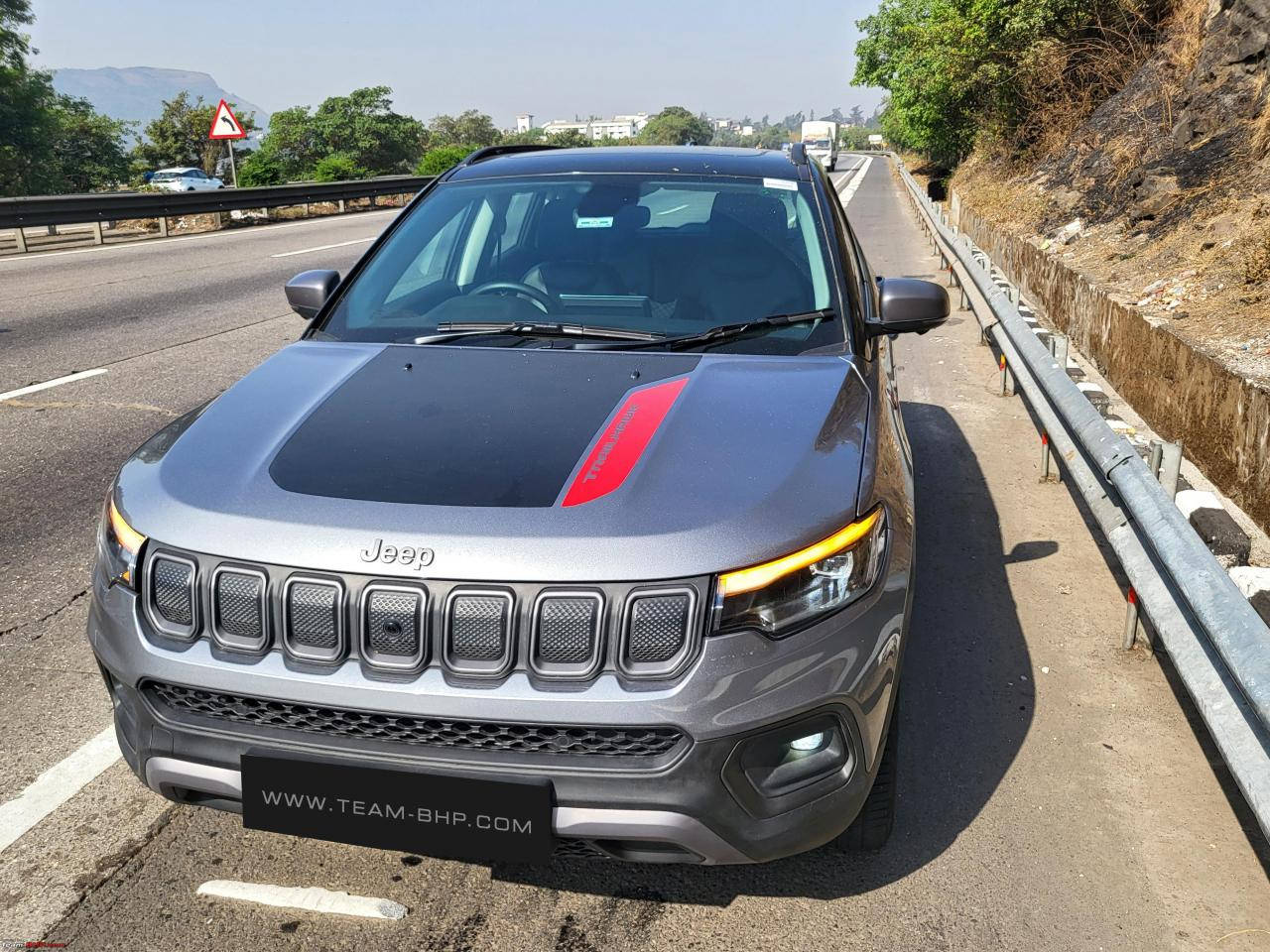 Caption: Rugged Adventure: The Jeep Compass Background