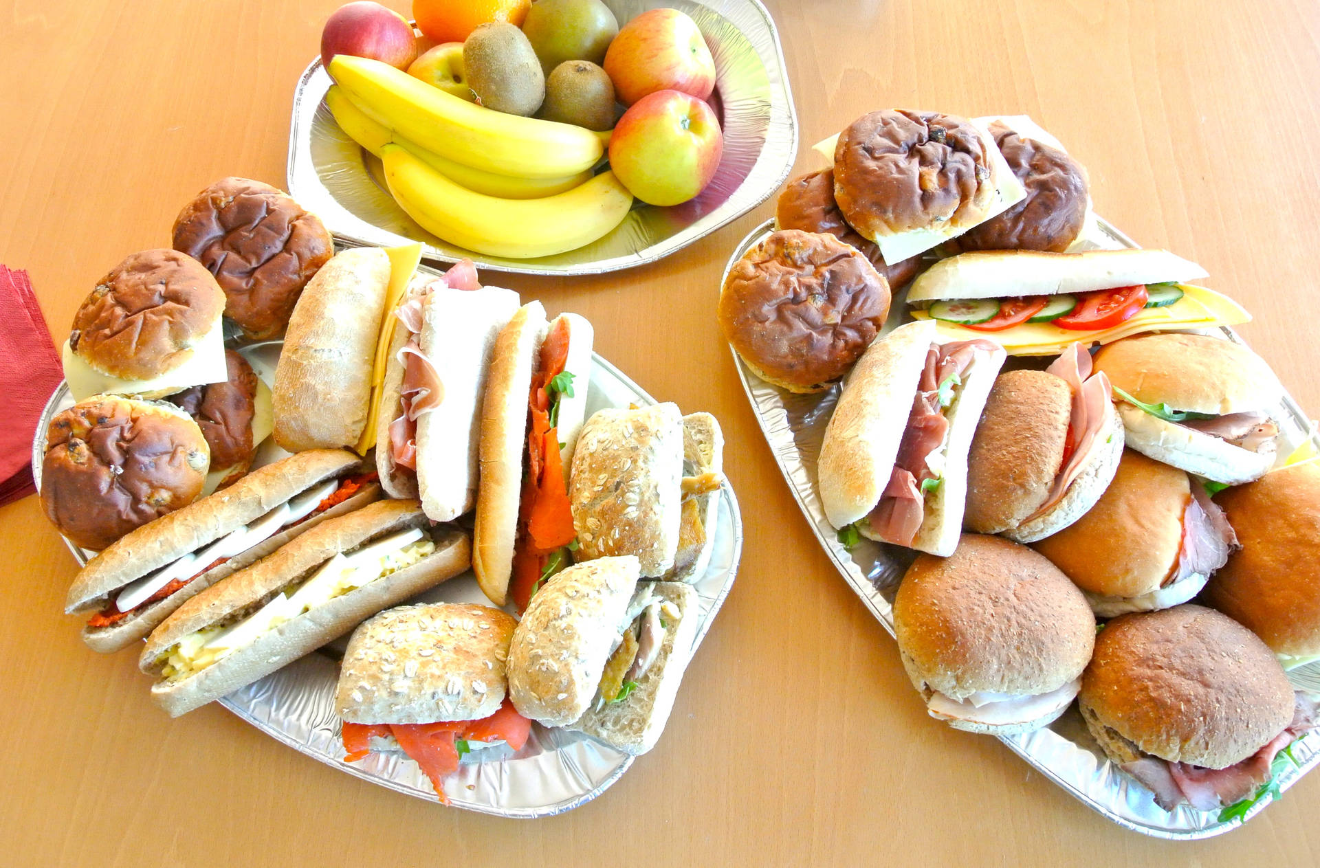 Caption: Savoring A Healthy Lunch: Sandwich Platter And Fruits