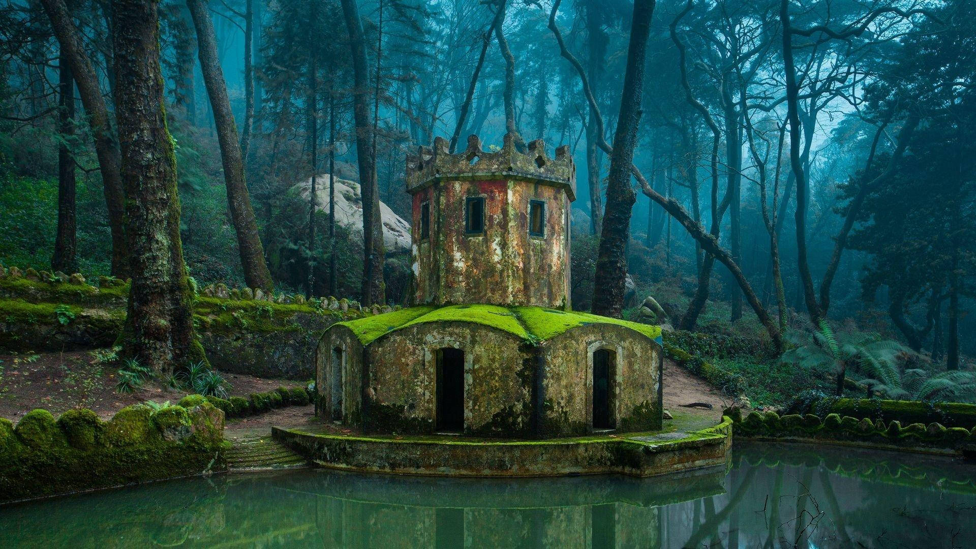 Caption: Scenic Valley Of The Lakes, Sintra, Portugal Background