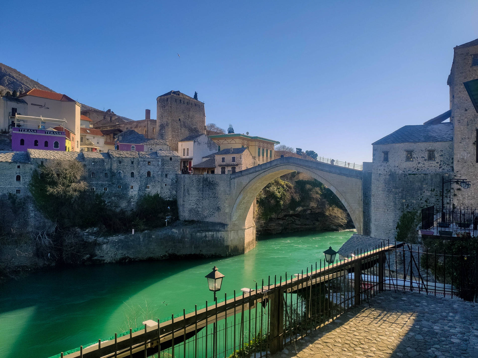 Caption: Scenic View Of The Ottoman Bridge In Mostar, Bosnia And Herzegovina Background