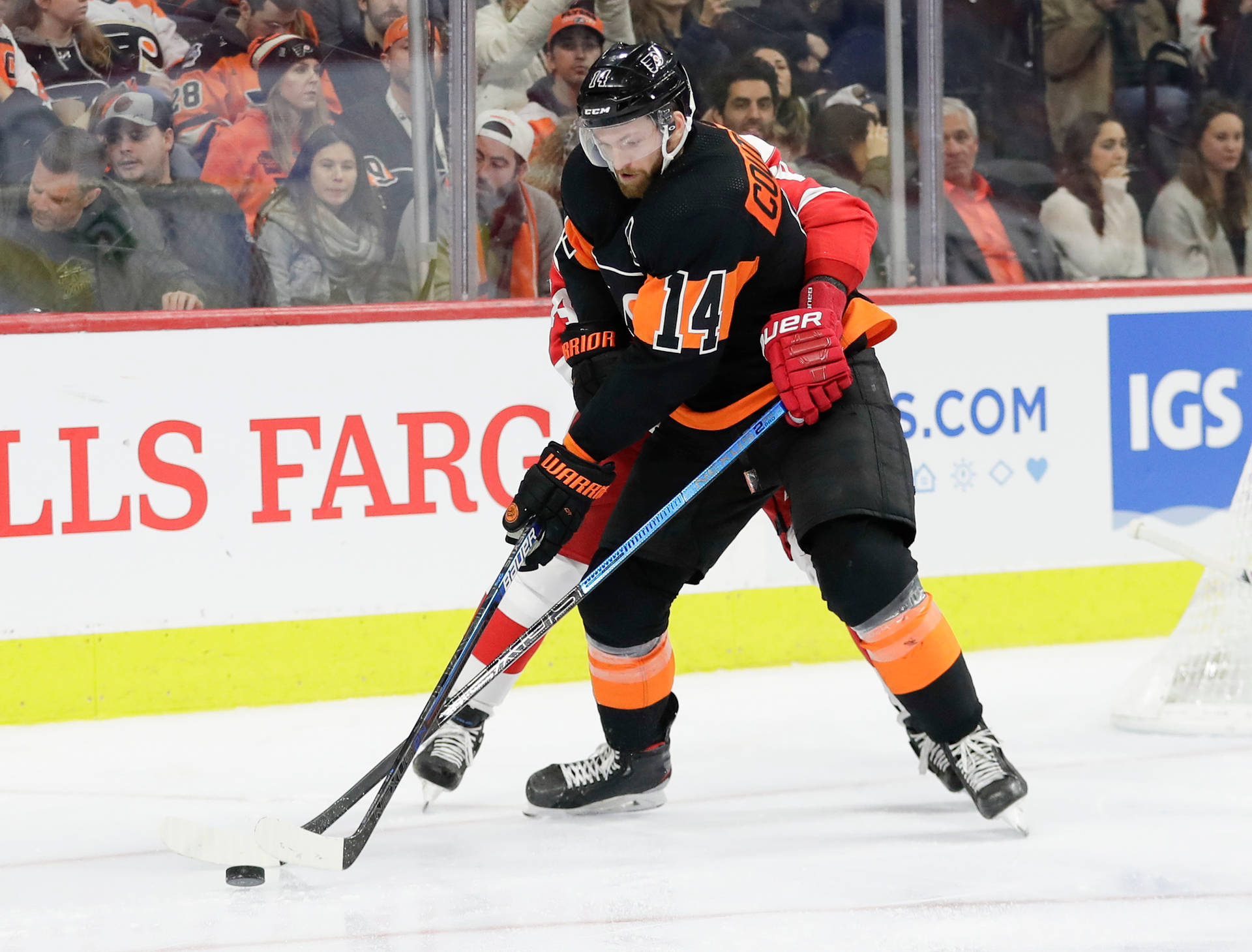 Caption: Sean Couturier Of The Philadelphia Flyers In Action Background