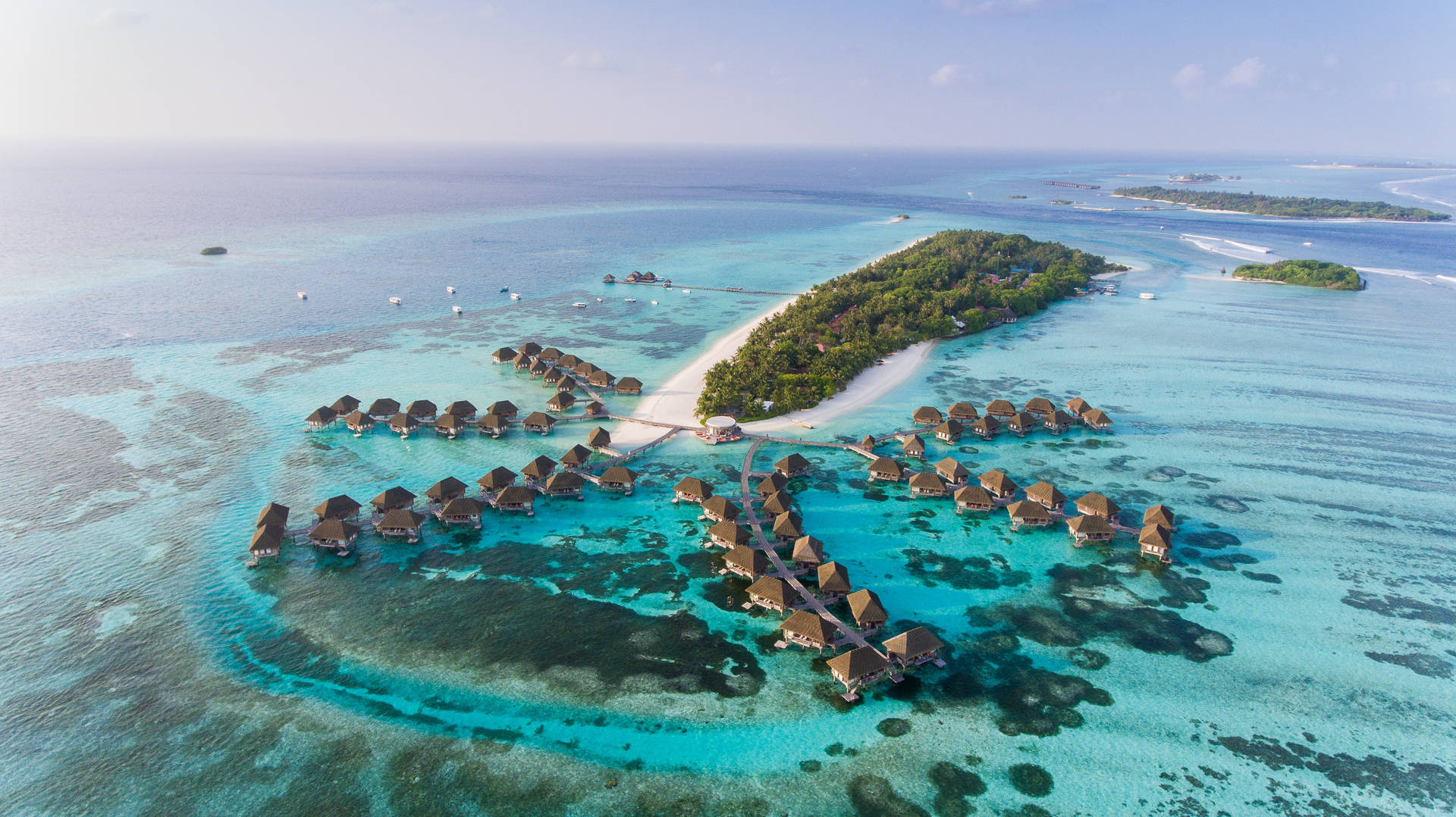 Caption: Serenity Unveiled At Club Med Kani, Maldives Background