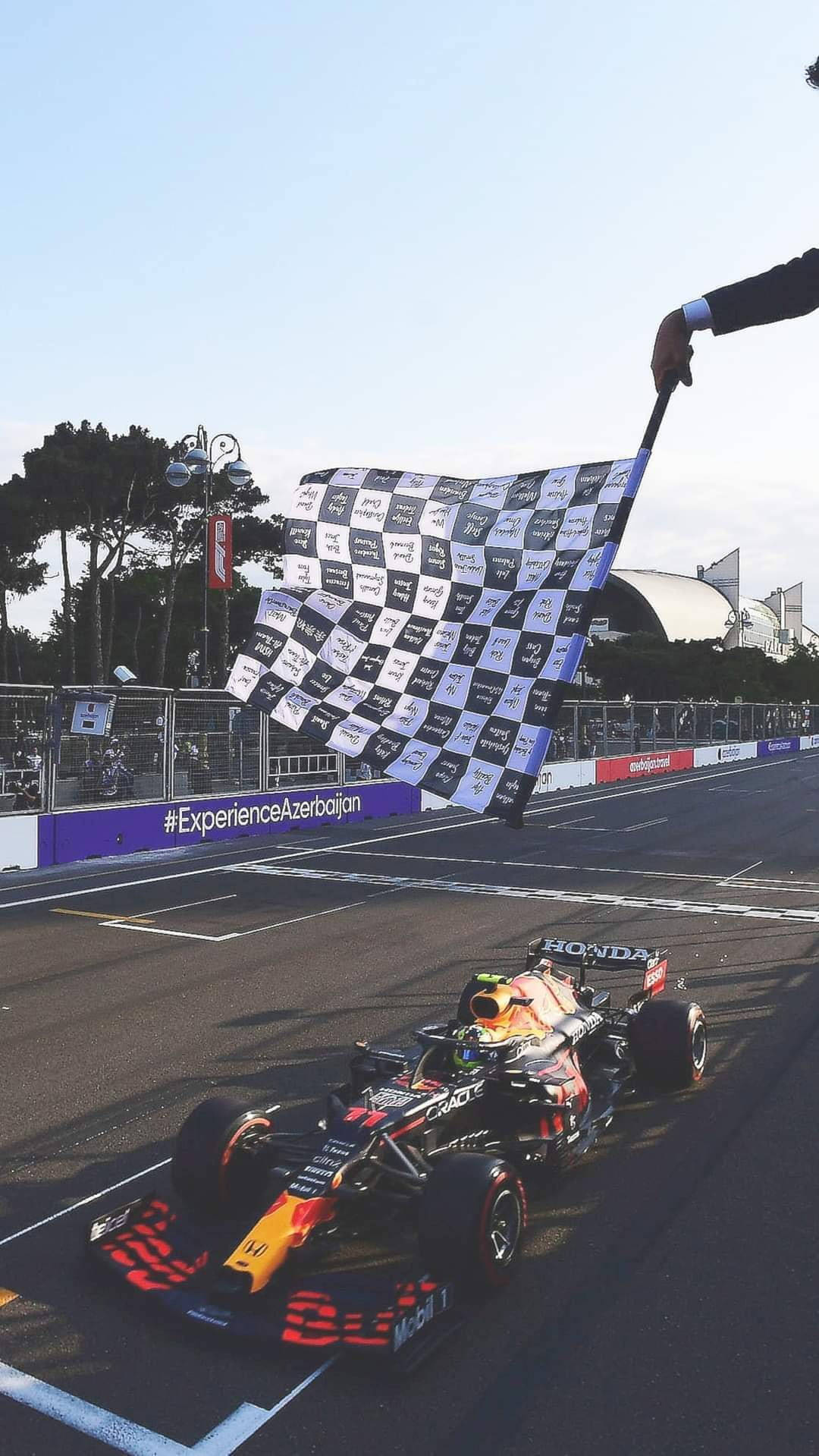 Caption: Sergio Perez At The Starting Line Background