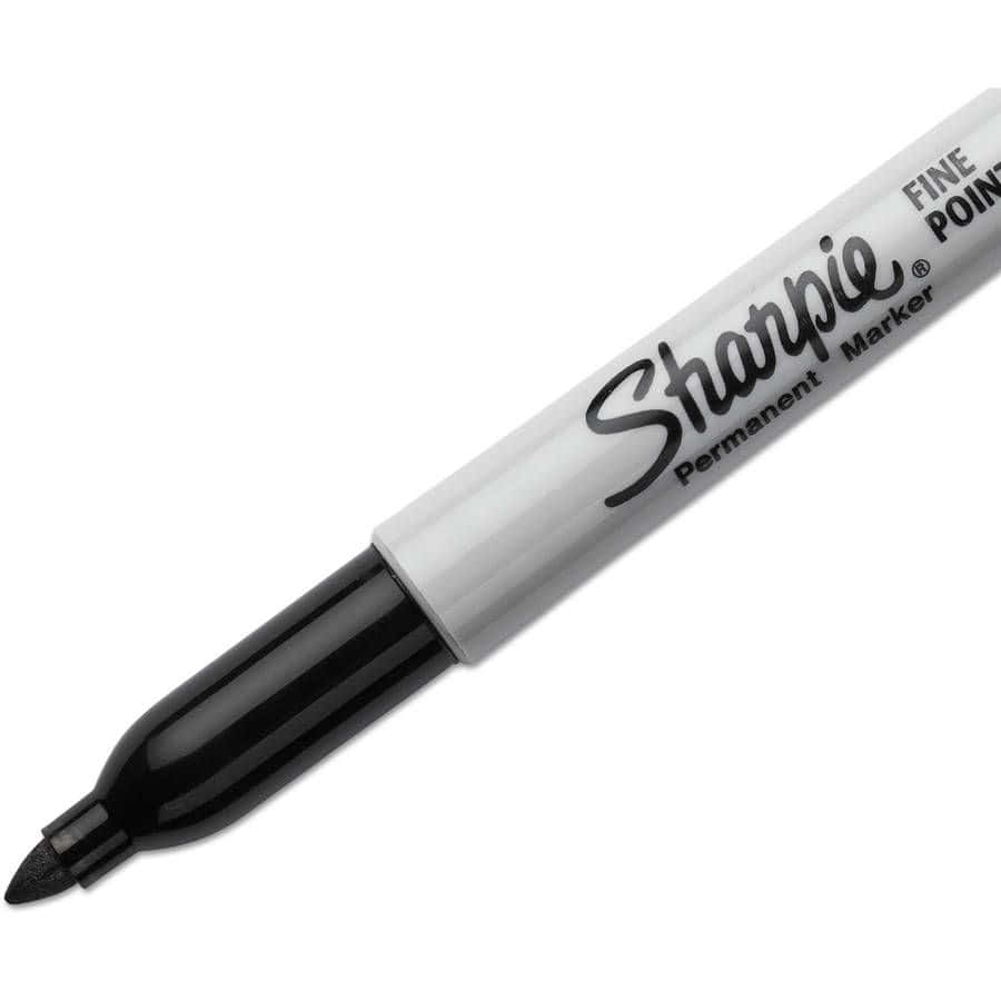 Caption: Sharpie Permanent Marker On White Background Background