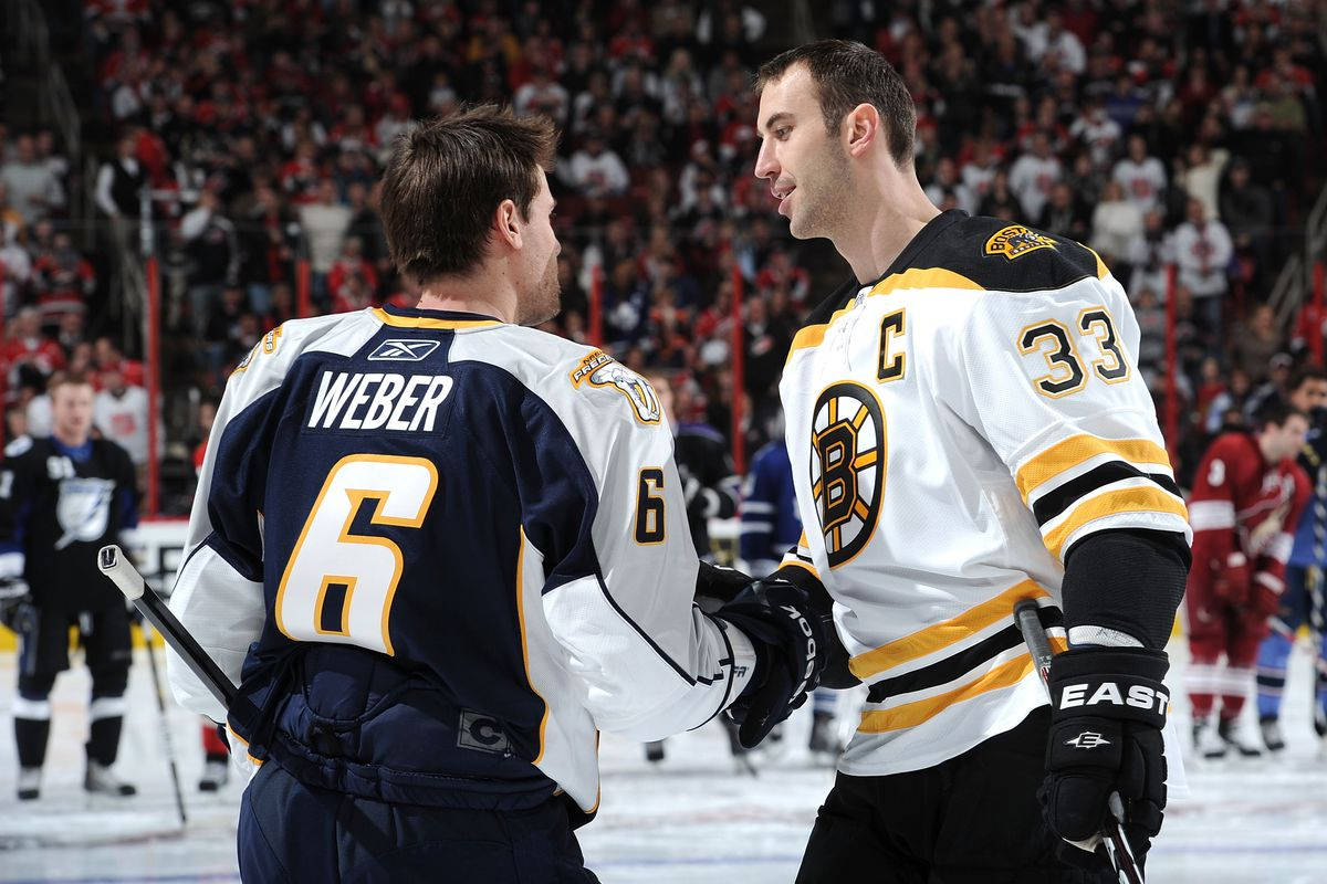 Caption: Shea Weber And Zdeno Chara Shaking Hands Post-game Background