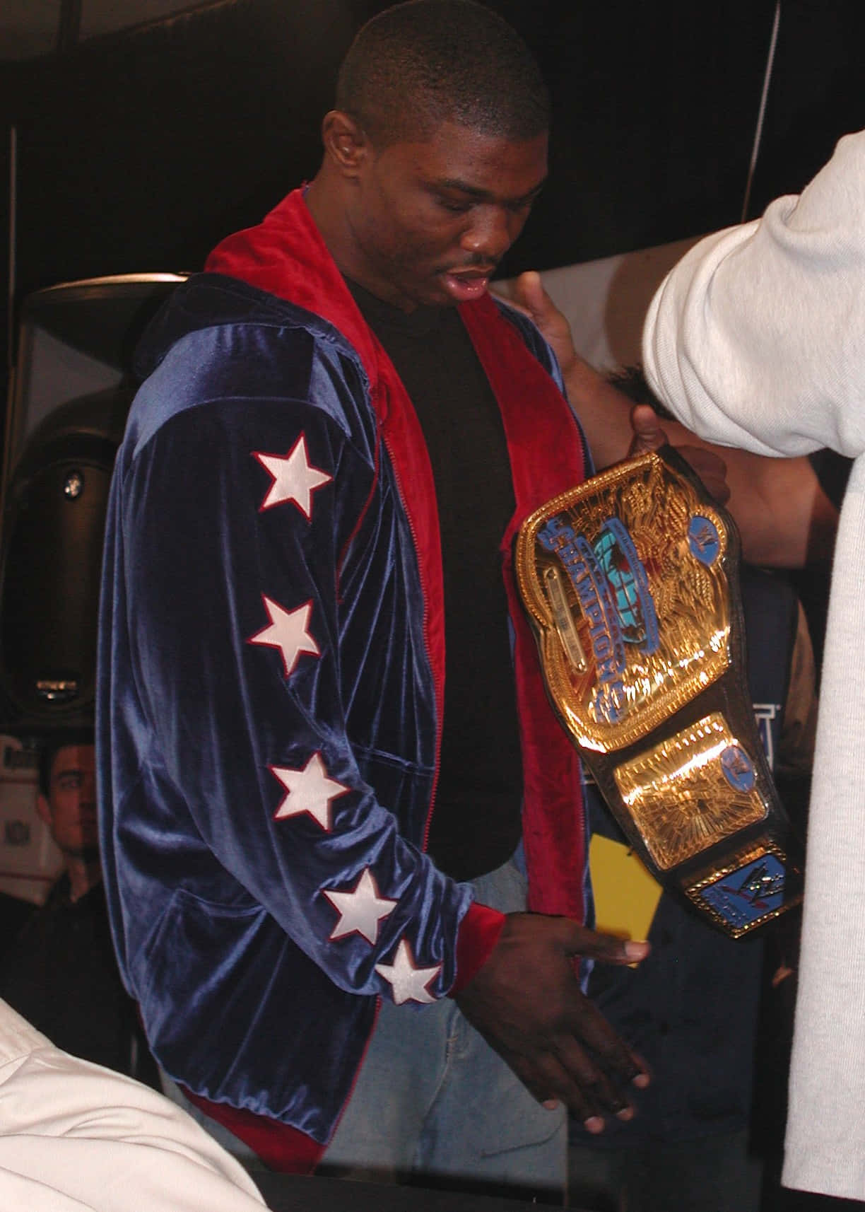 Caption: Shelton Benjamin Seizes Victory With Championship Belt Background