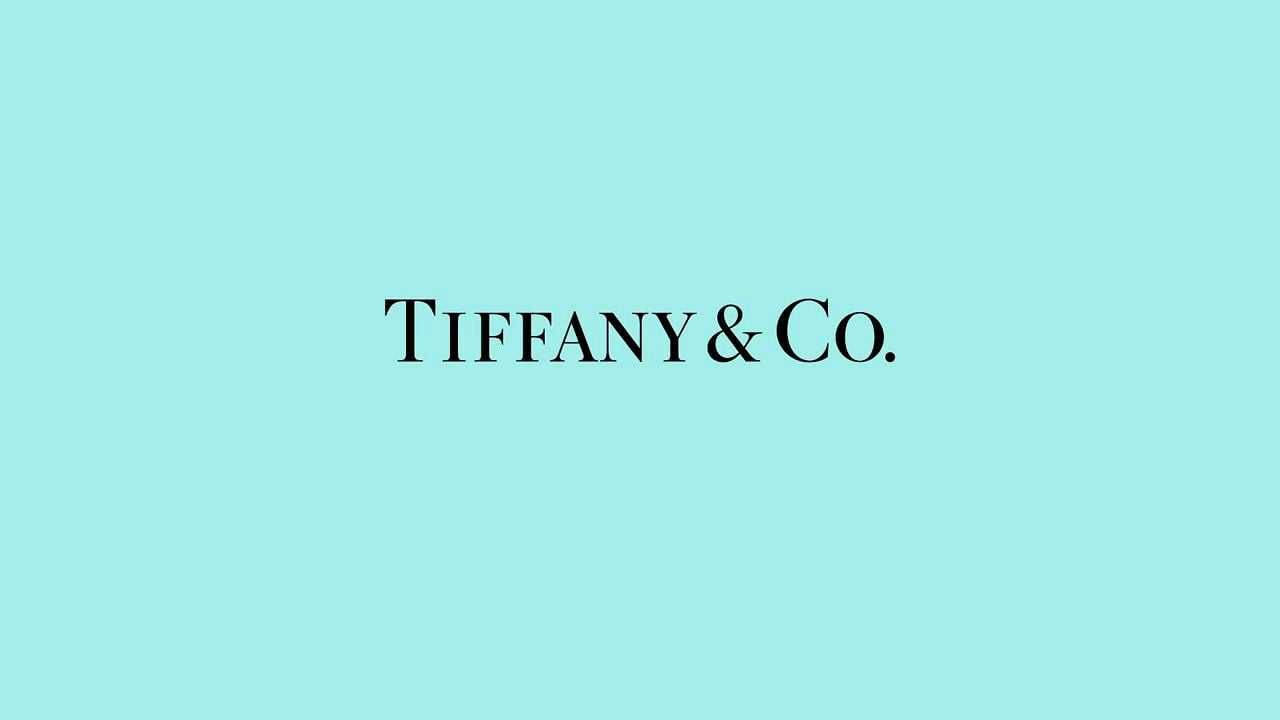 Caption: Shimmering Elegance & Simplicity In Tiffany Blue Background