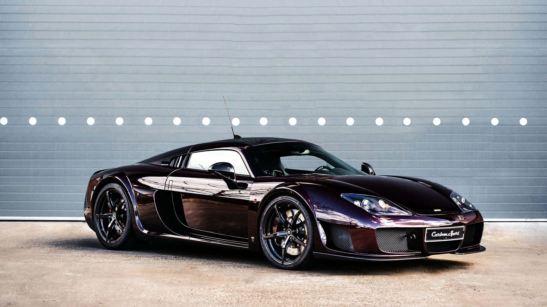 Caption: Shiny Metallic Purple Noble M600 Sports Car Background