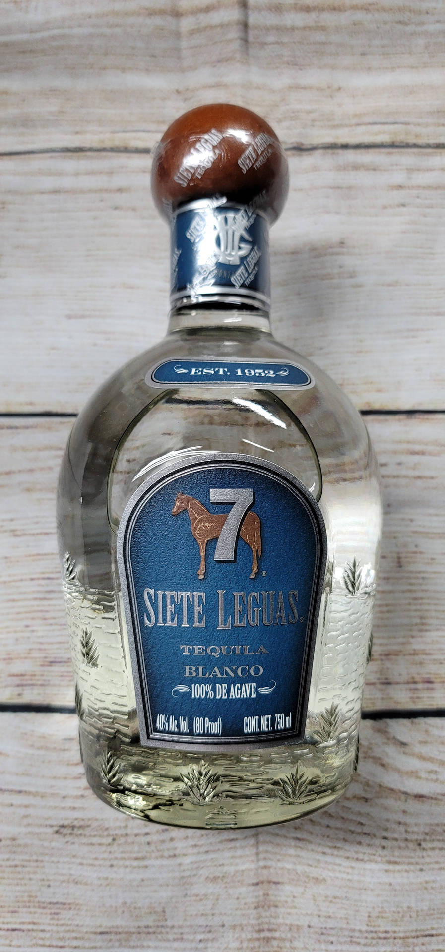 Caption: Siete Leguas Blanco Tequila Bottle Edition Background