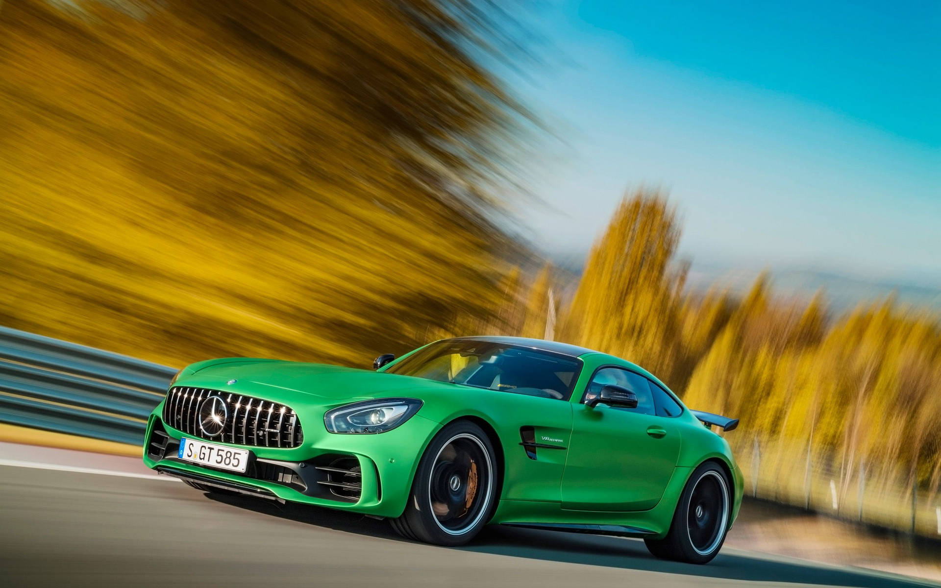 Caption: Sleek Green Hell Magno Mercedes-amg Gtr Showcasing Power And Style Background