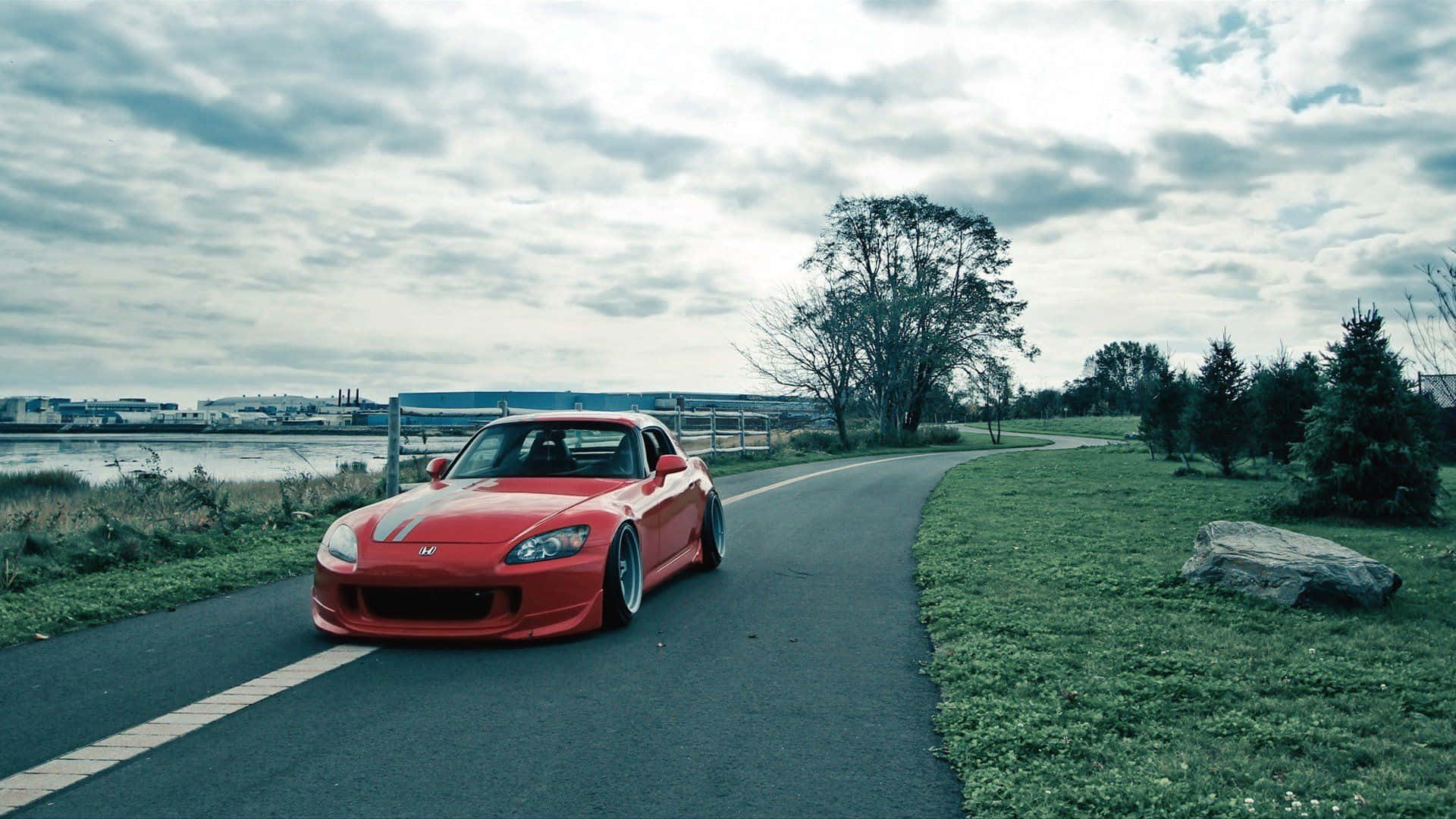 Caption: Sleek Honda S2000 In Vibrant Setting