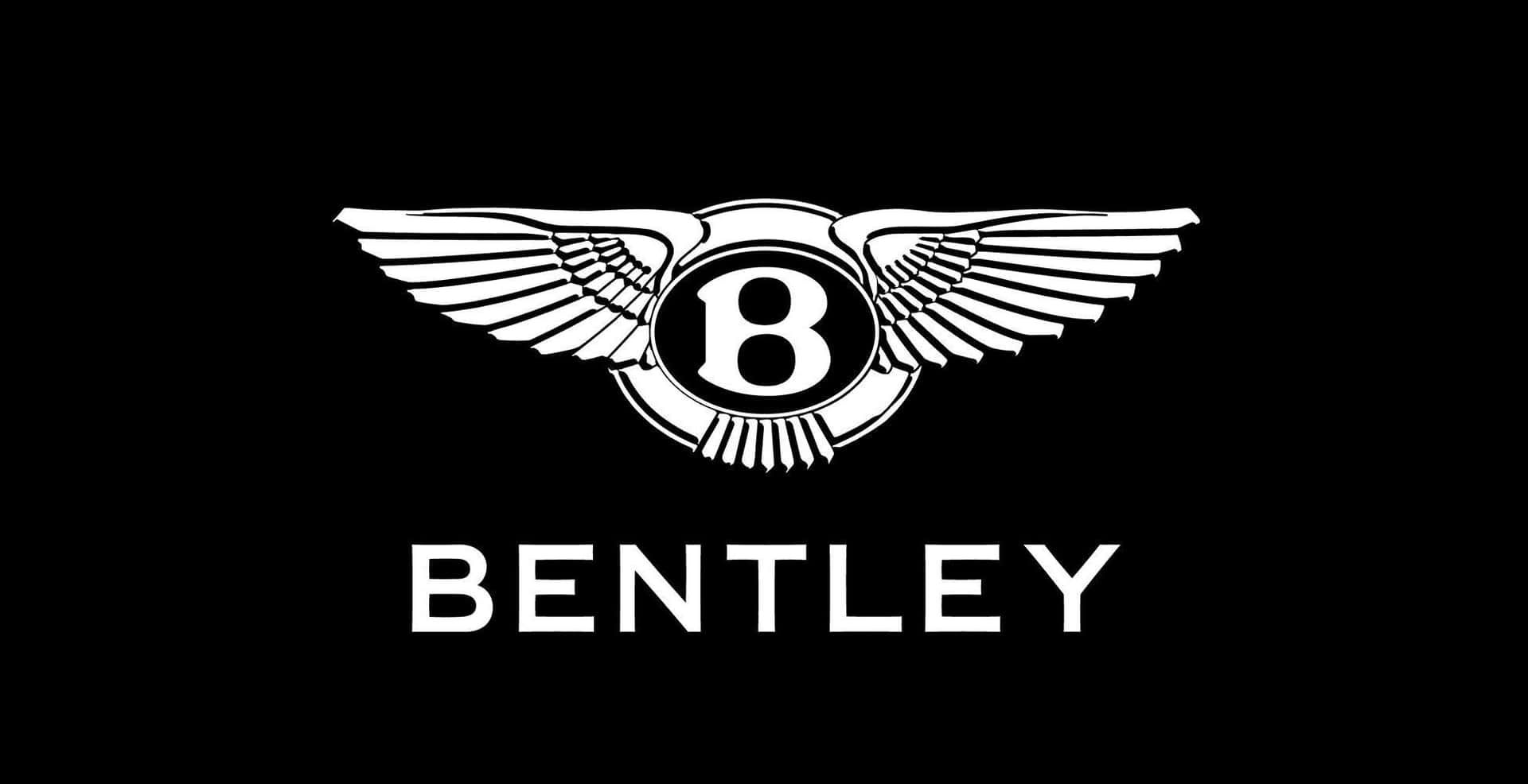 Caption: Sleek Luxury Car Logo On A Dark Background Background