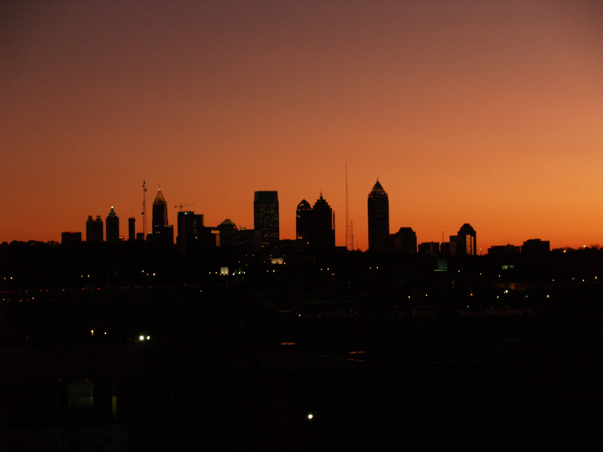 Caption: Spectacular Atlanta Skyline Silhouette At Twilight. Background