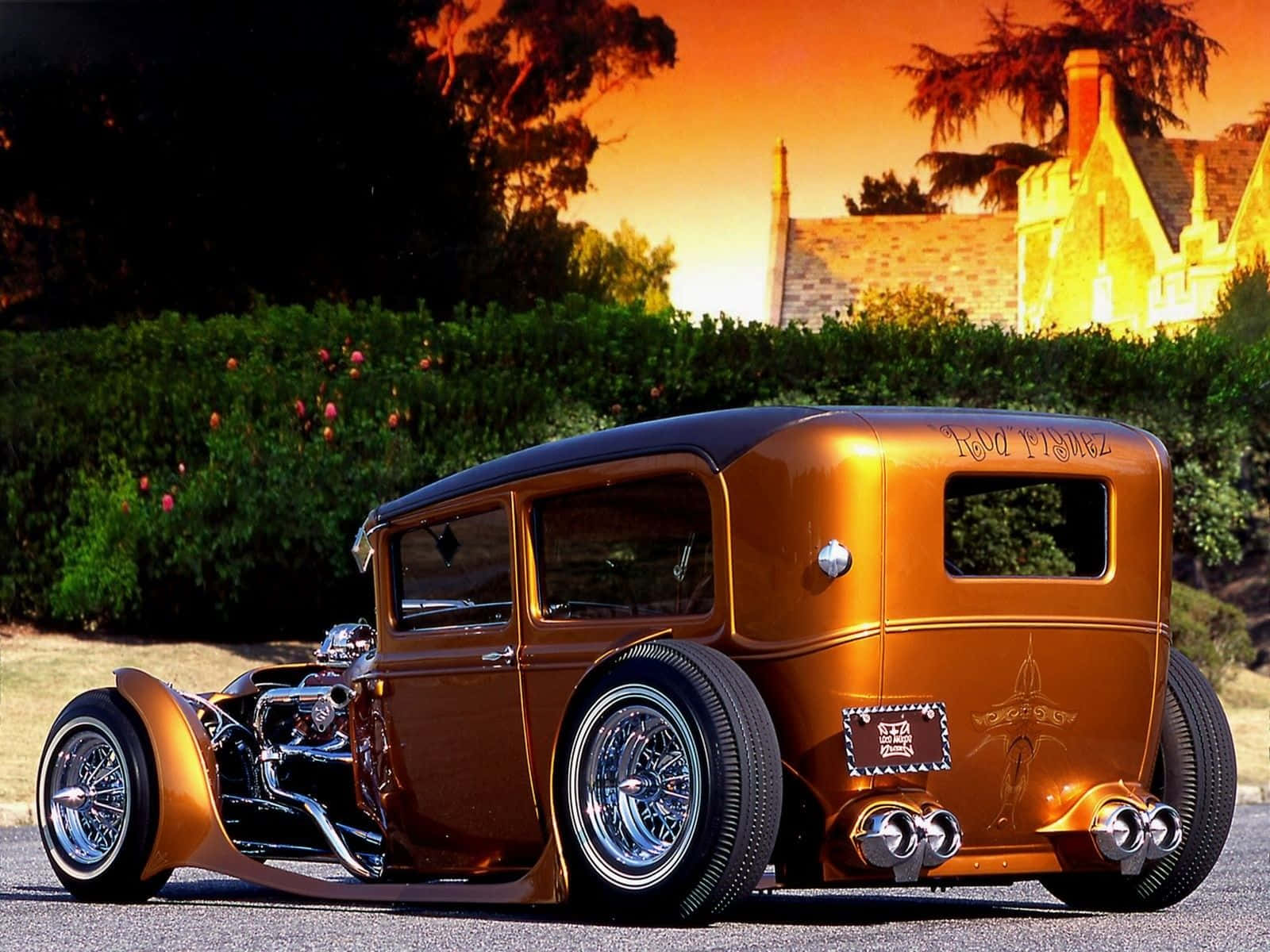 Caption: Speed And Power Unleashed: Stunning Hot Rod On The Open Road Background