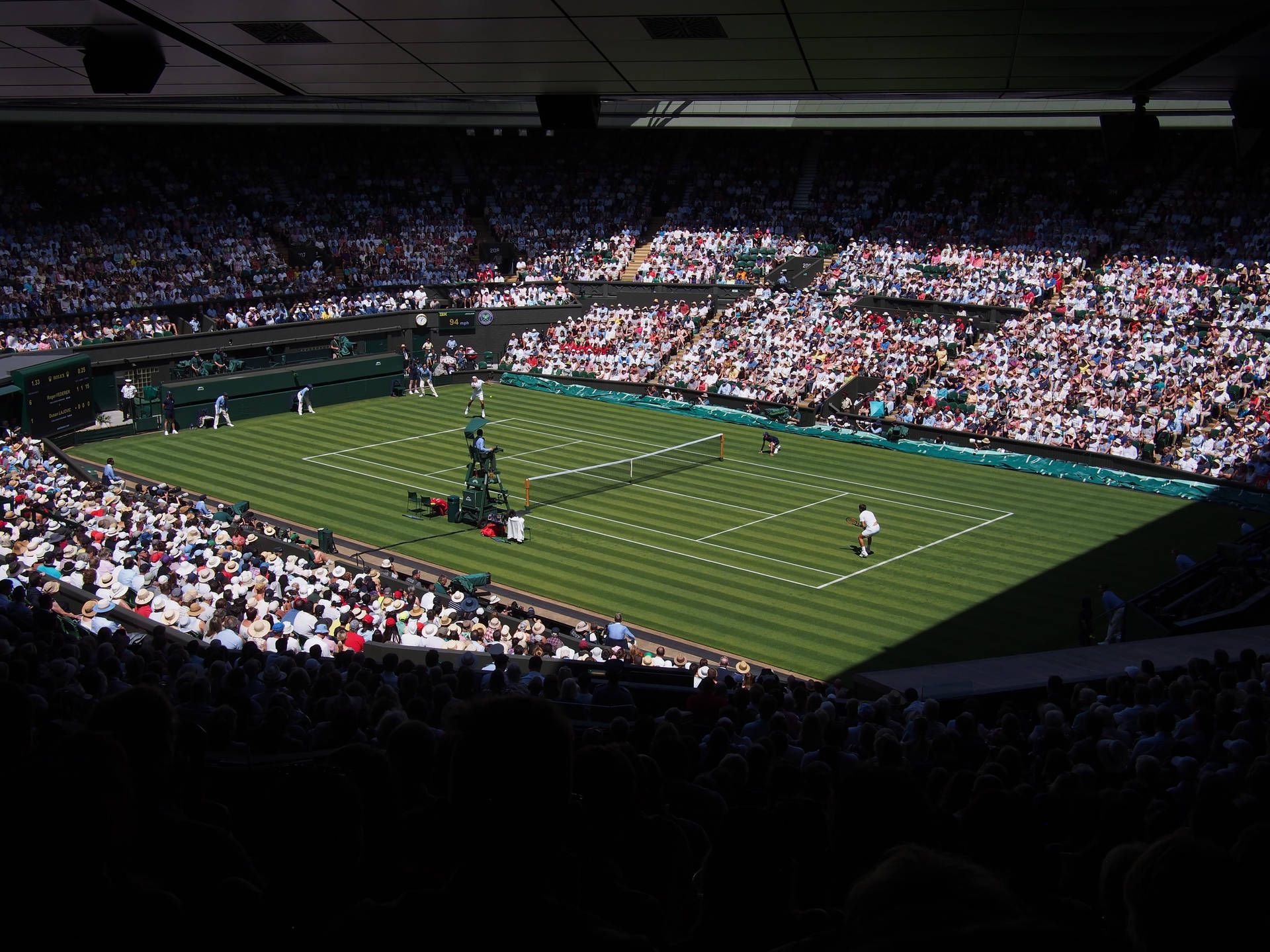 Caption: Splendid View Of The Iconic Wimbledon Tennis Court Background