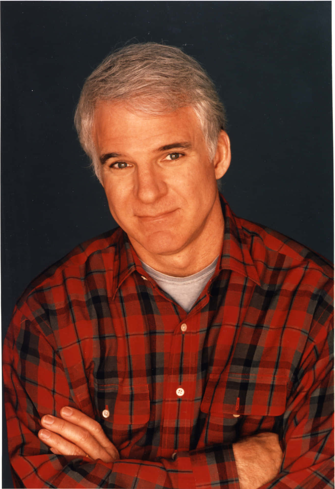 Caption: Steve Martin's Artistic Portrait Background