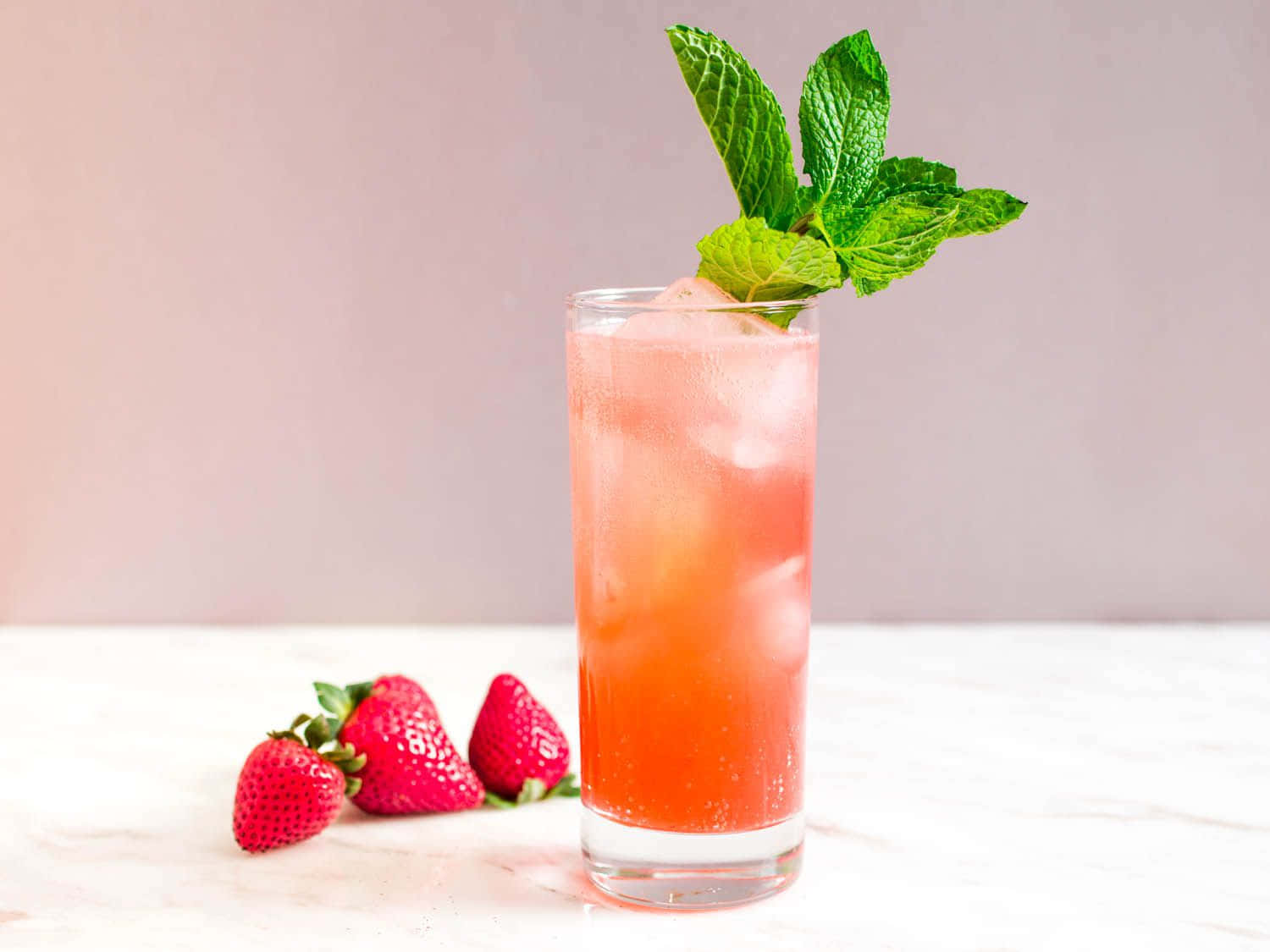 Caption: Strawberry Mint Sparkler Cocktail In High Definition Background