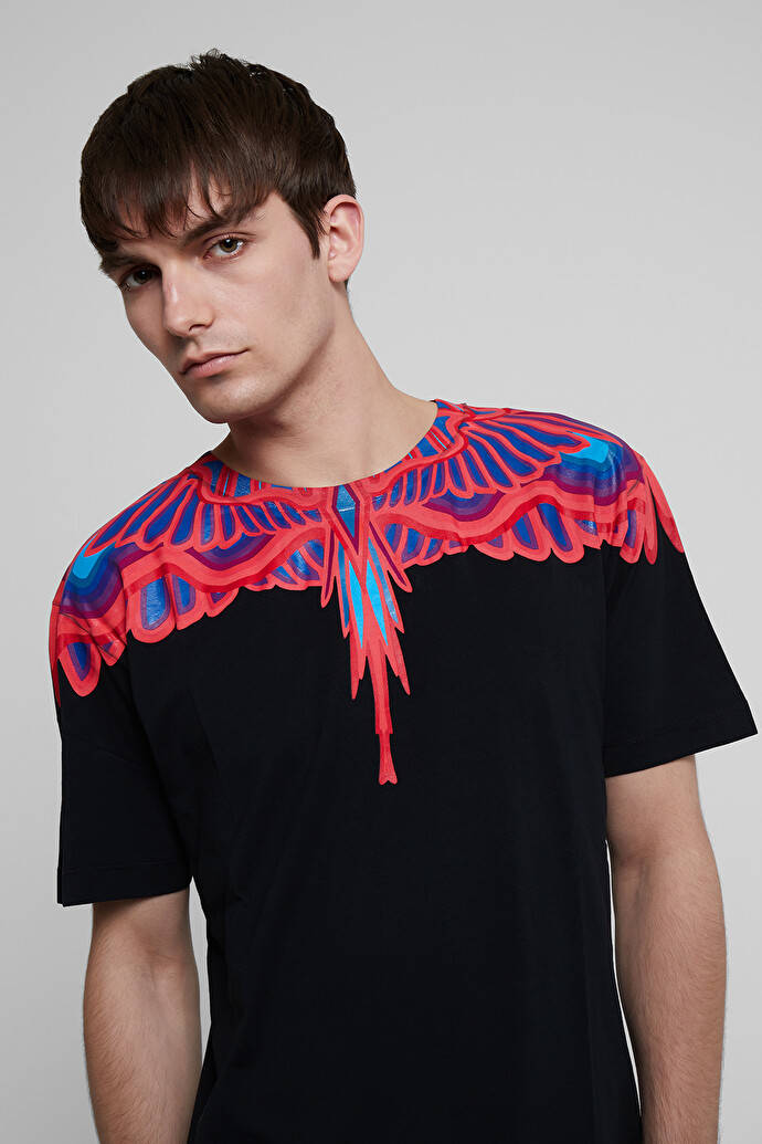 Caption: Striking Red Wings Design Black Shirt By Marcelo Burlon Background