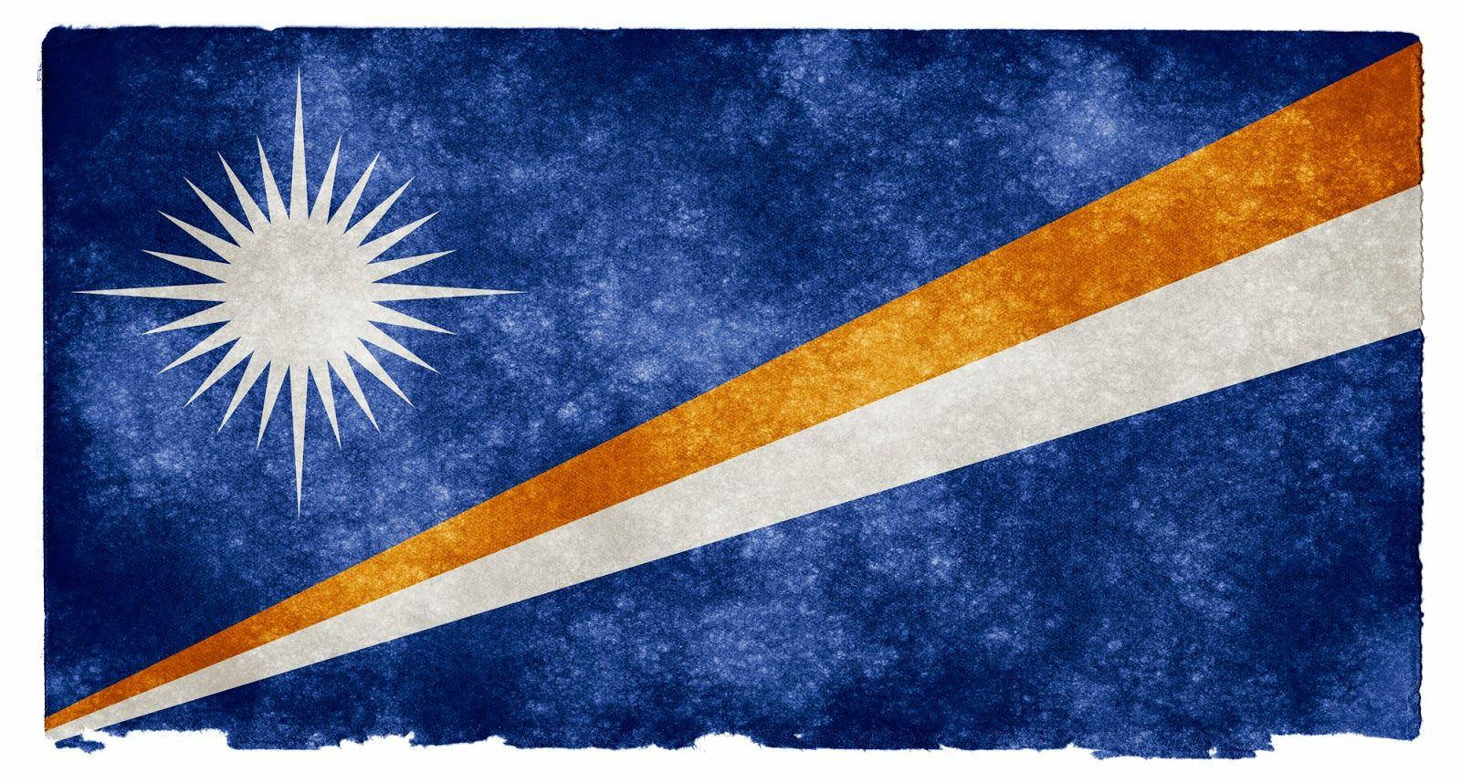 Caption: Strong Pride Of The Marshall Islands - A Tattered Flag Background
