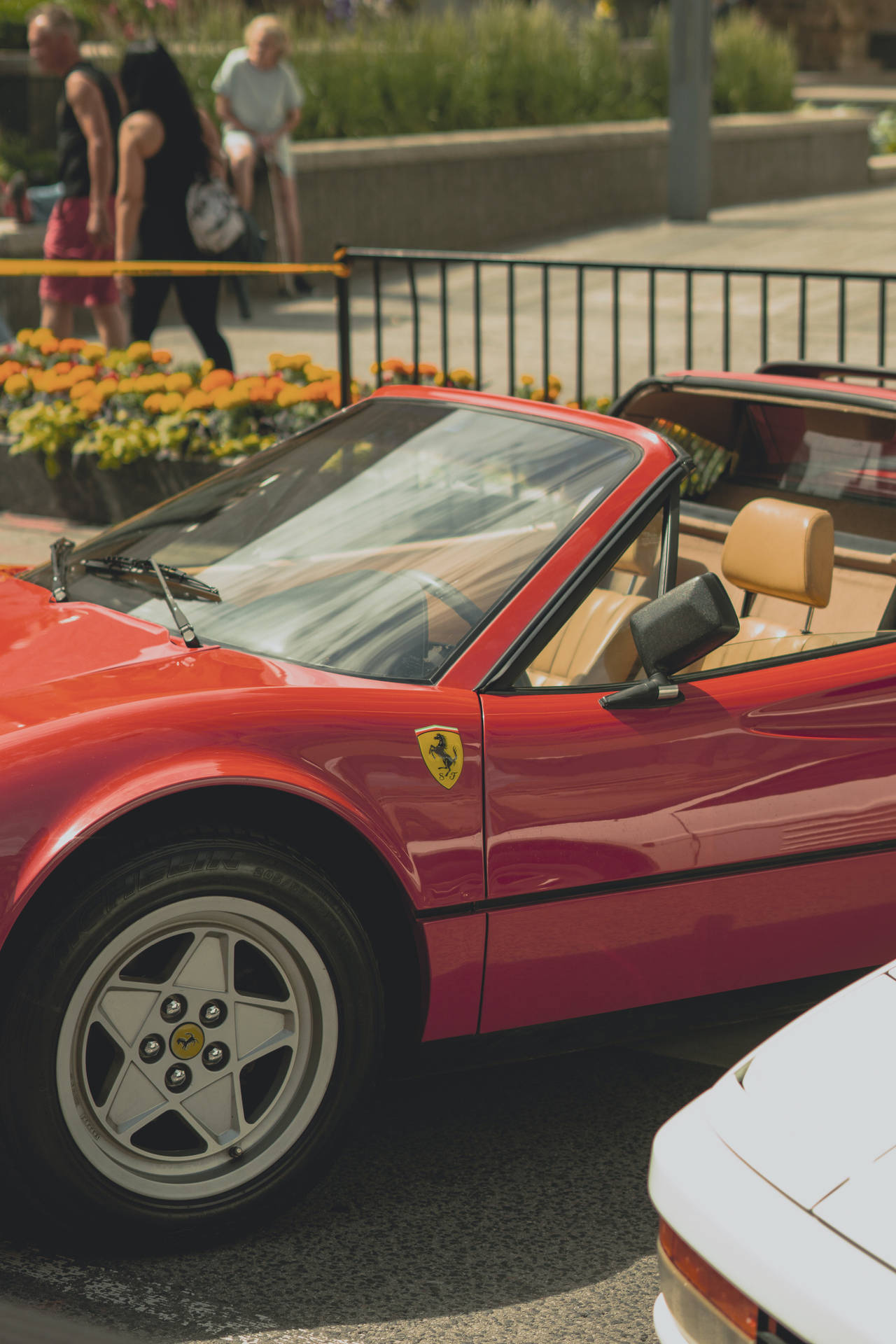 Caption: Stunning Ferrari Showcasing The Vivid Clarity Of The Iphone 11 Pro Max 4k Resolution. Background