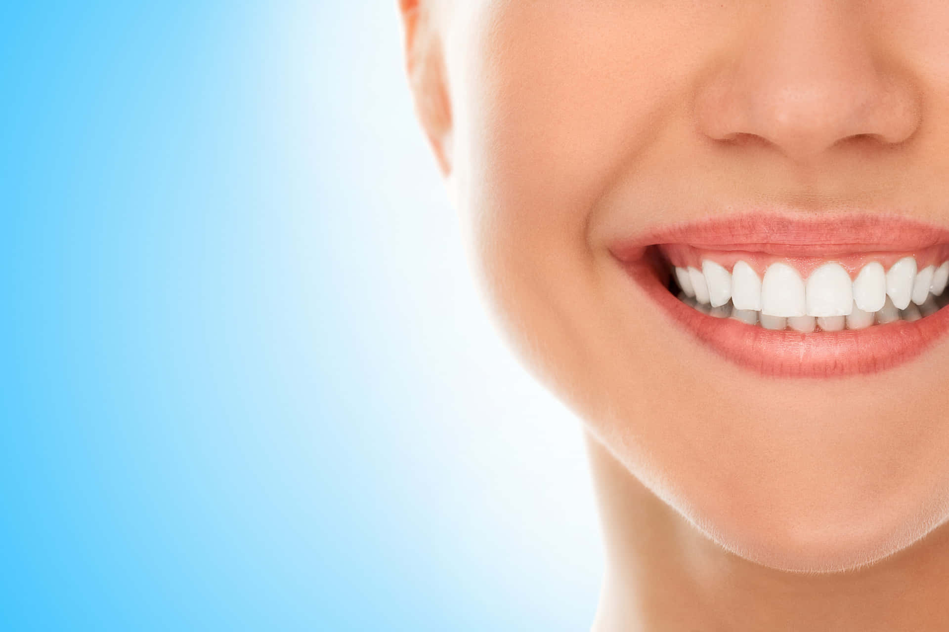 Caption: Stunning Smile With Healthy Permanent Teeth Background