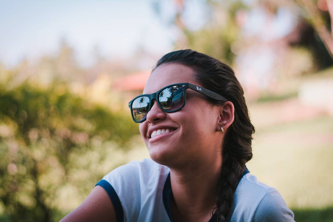 Caption: Stylish Woman In Classic Ray-ban Eyewear