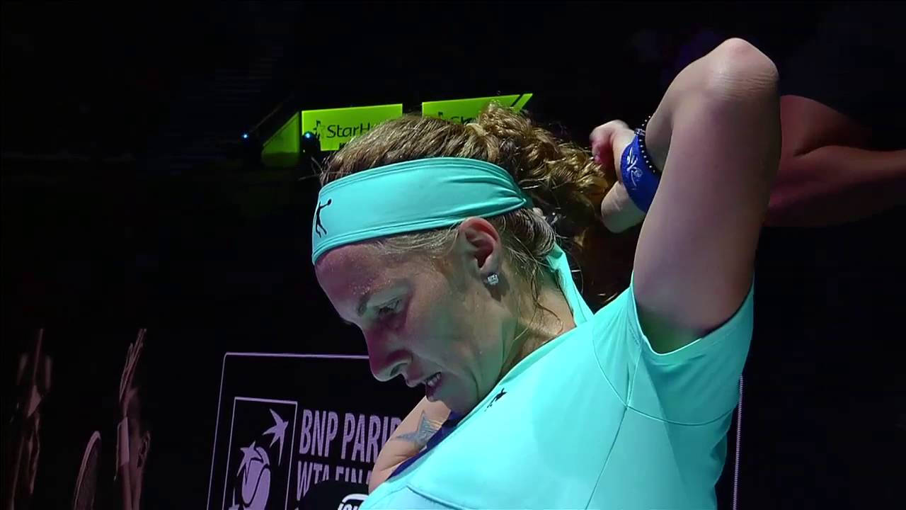 Caption: Svetlana Kuznetsova Concentrating On Her Braided Hair Background