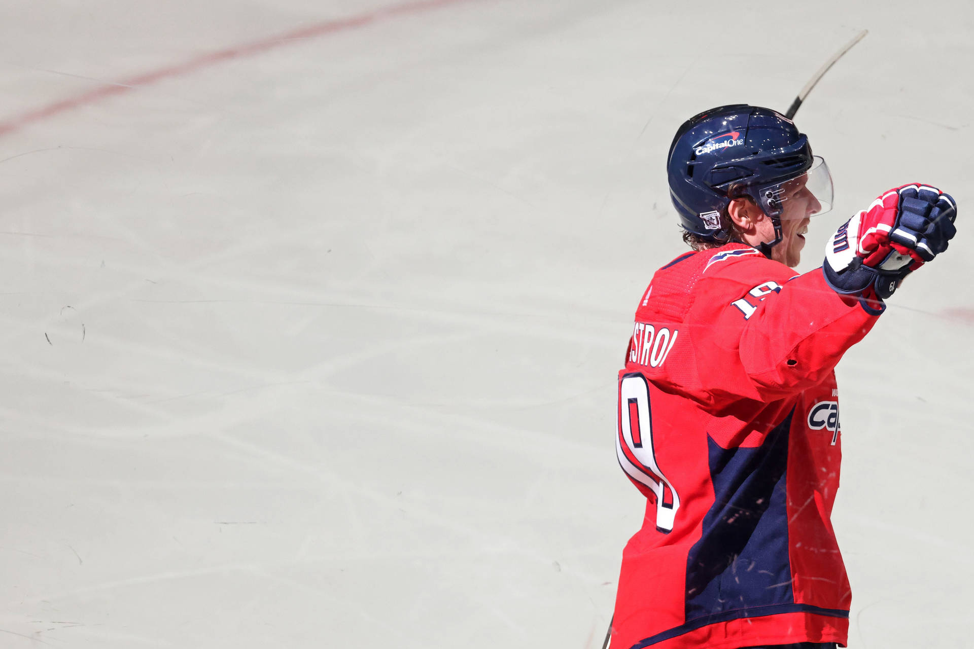 Caption: Swedish Ice Hockey Star Nicklas Backstrom In Action On The Ice Rink. Background